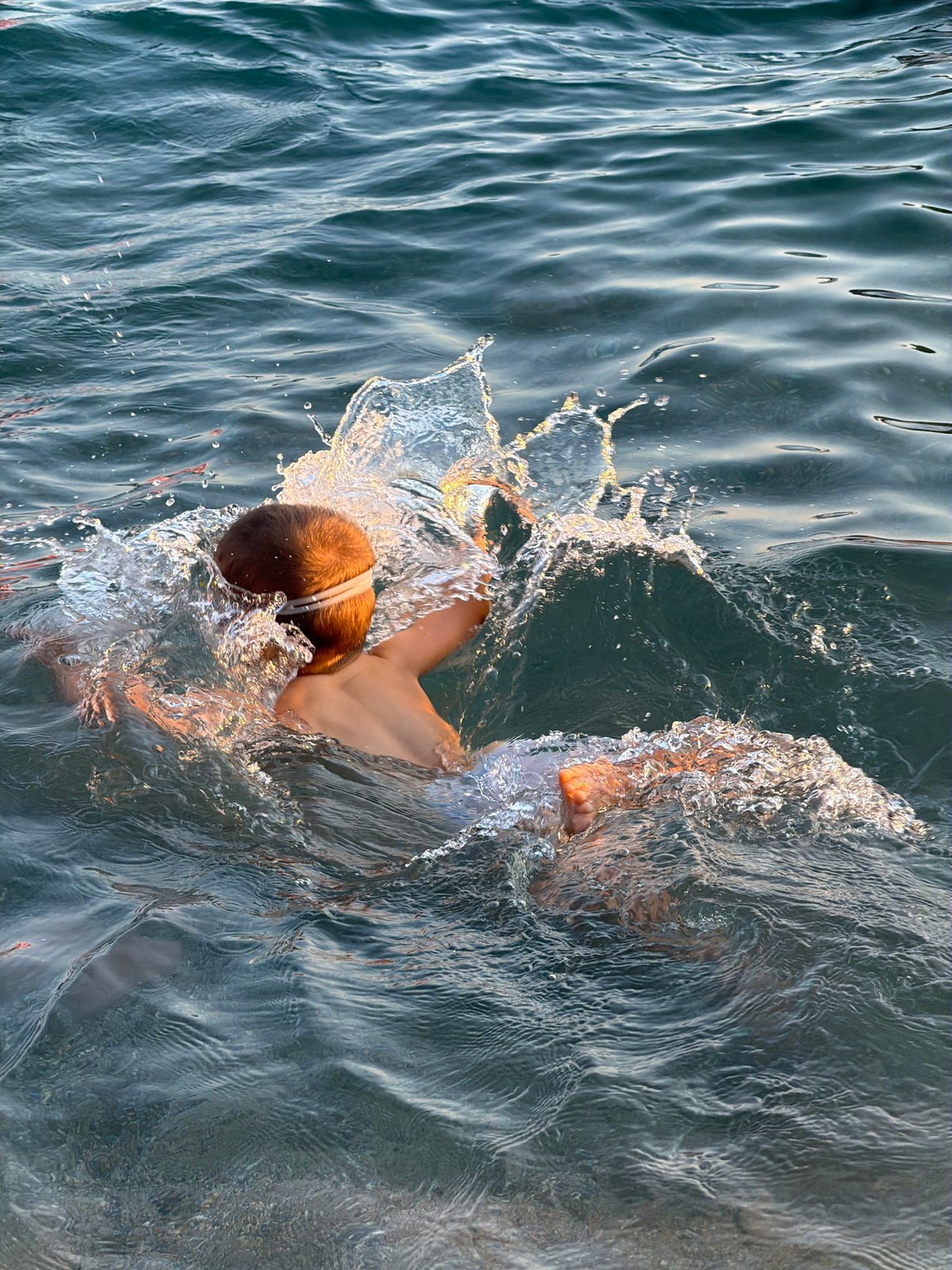 Sunset swim session at Bečići beach, Montenegro