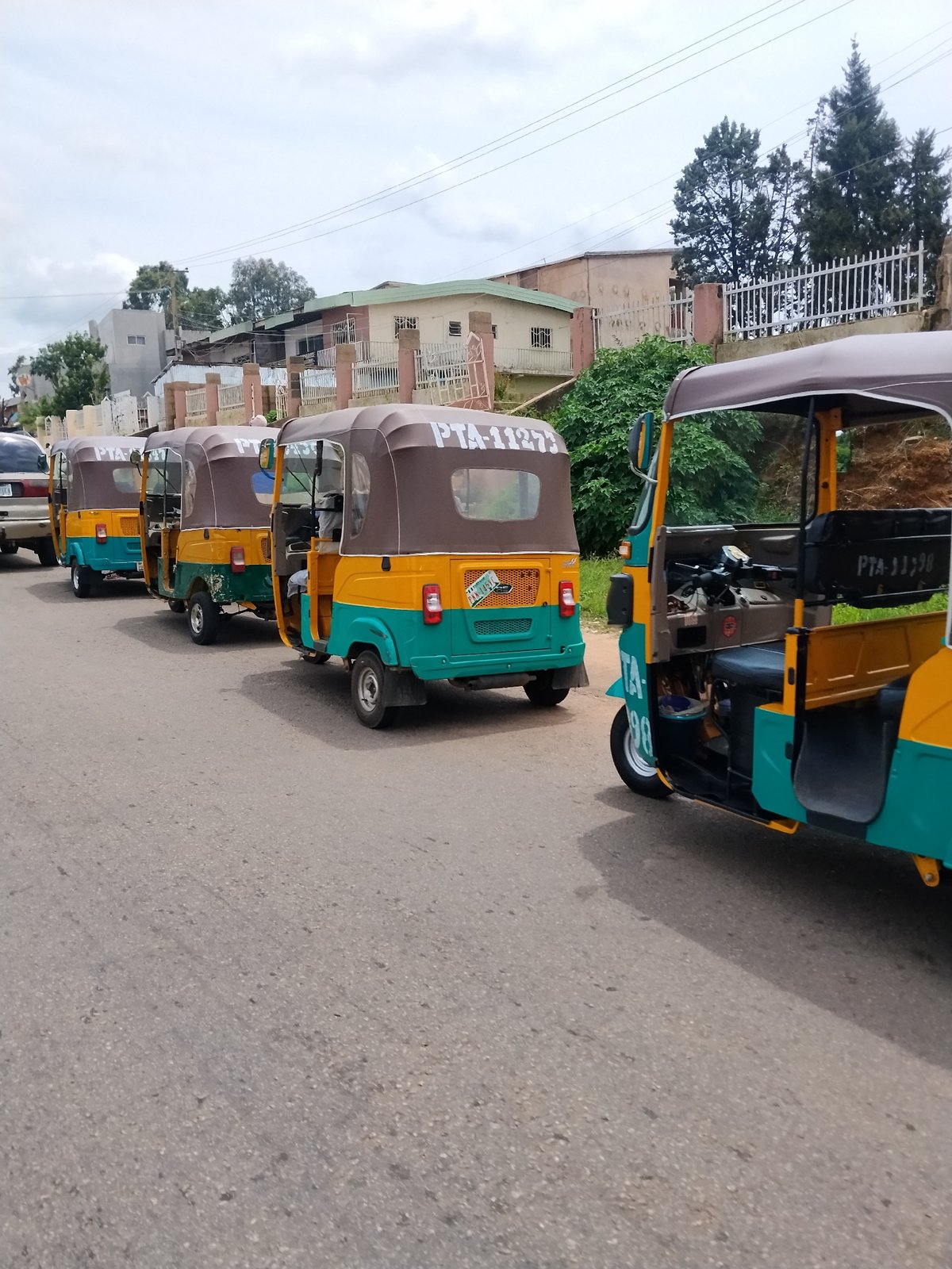 Keke Napeps, street food, and busy roads in Jos