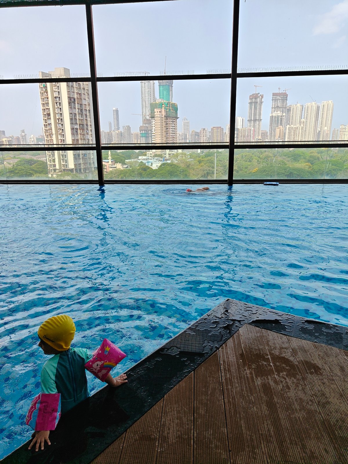 Early morning swimming session at Mumbai rooftop pool facility