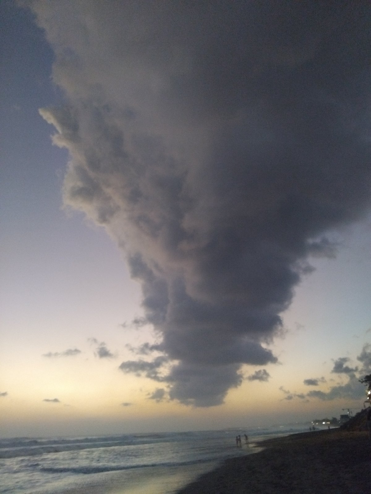 Dramatic sunset with storm clouds witnessed at North Kuta beach