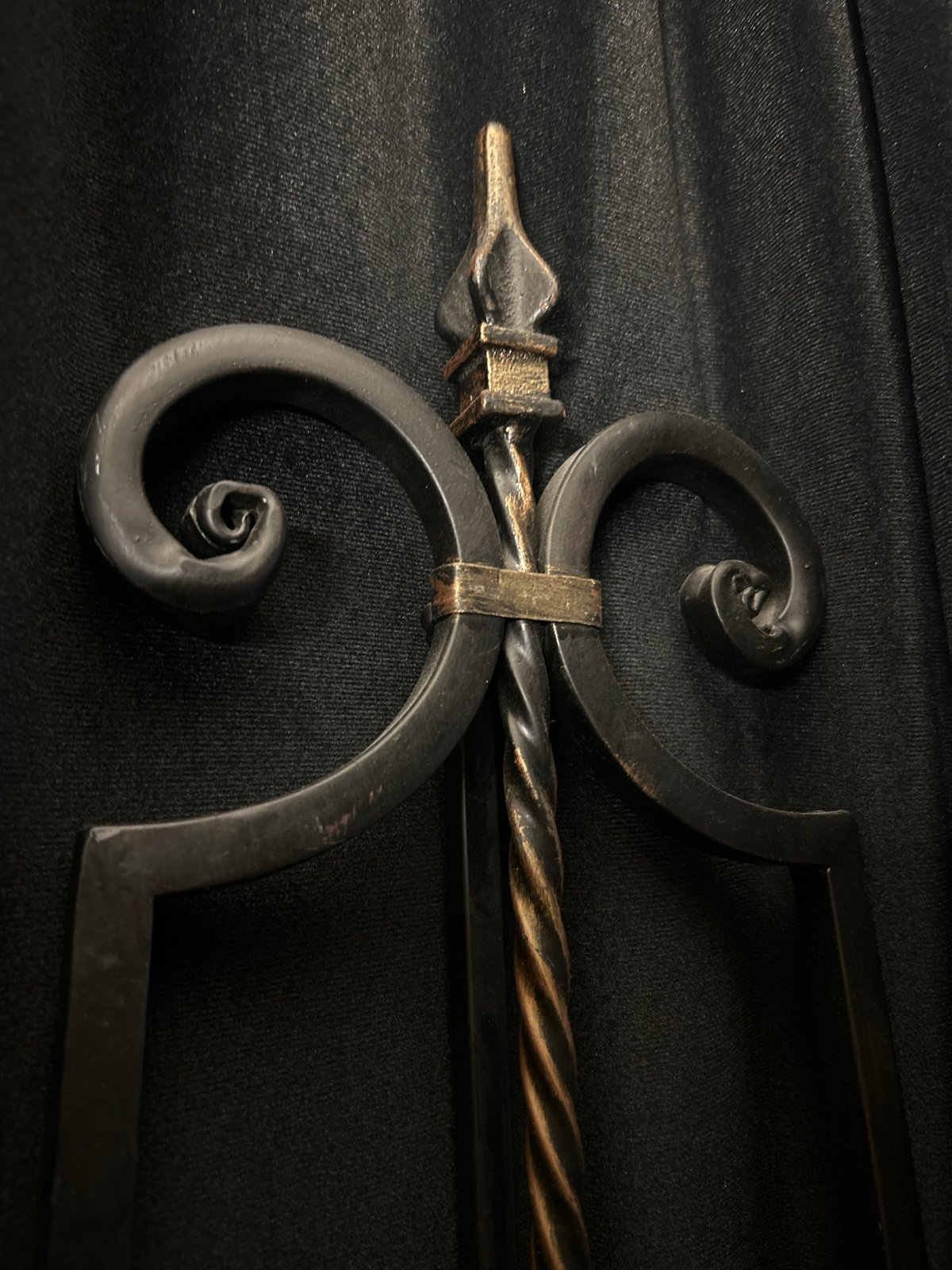 Ornate metal object with scrollwork observed in Cape Coral