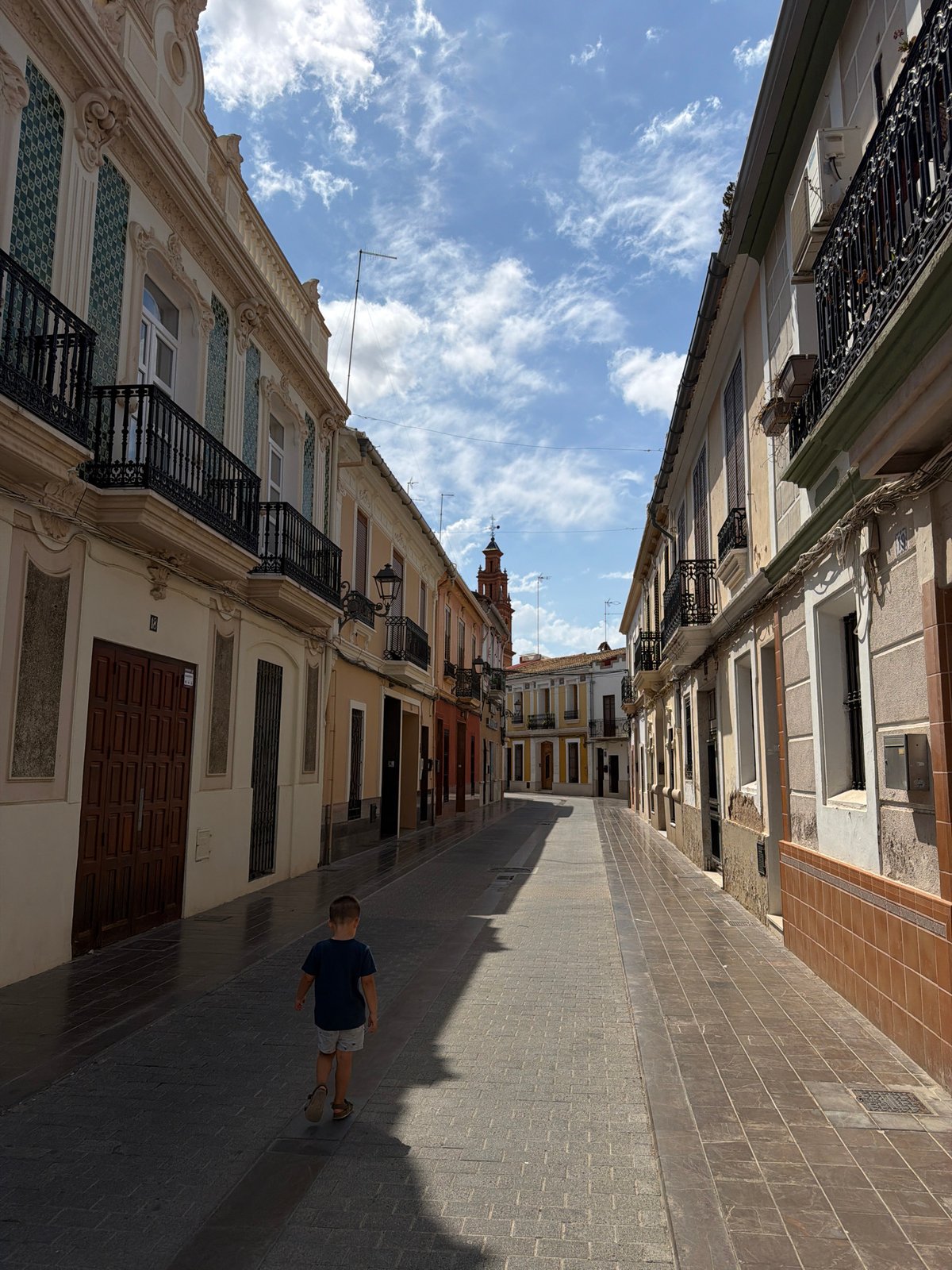Morning life captured across Mediterranean-style city neighborhoods