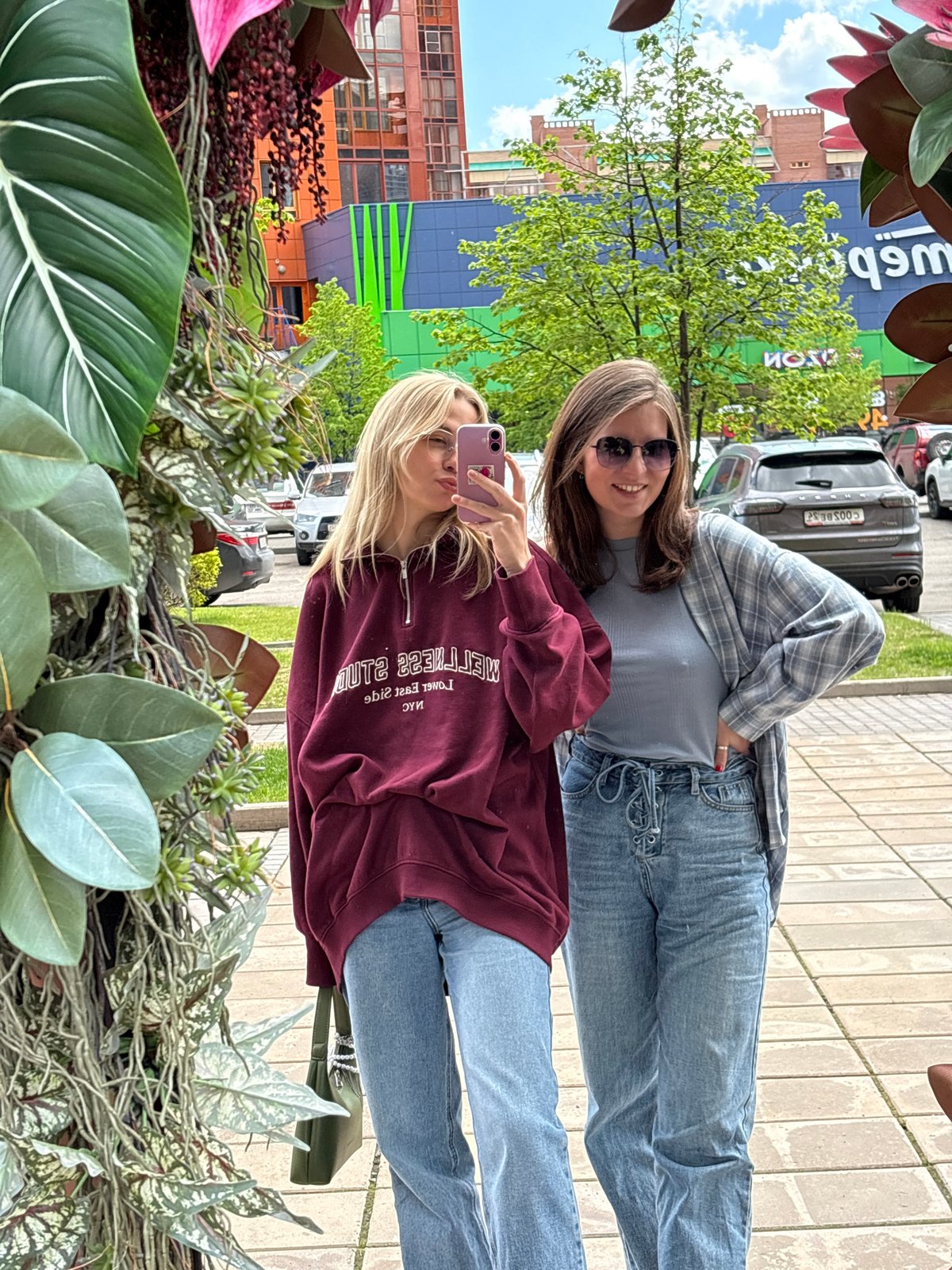 Two women enjoy morning cafe visit in Krasnoyarsk