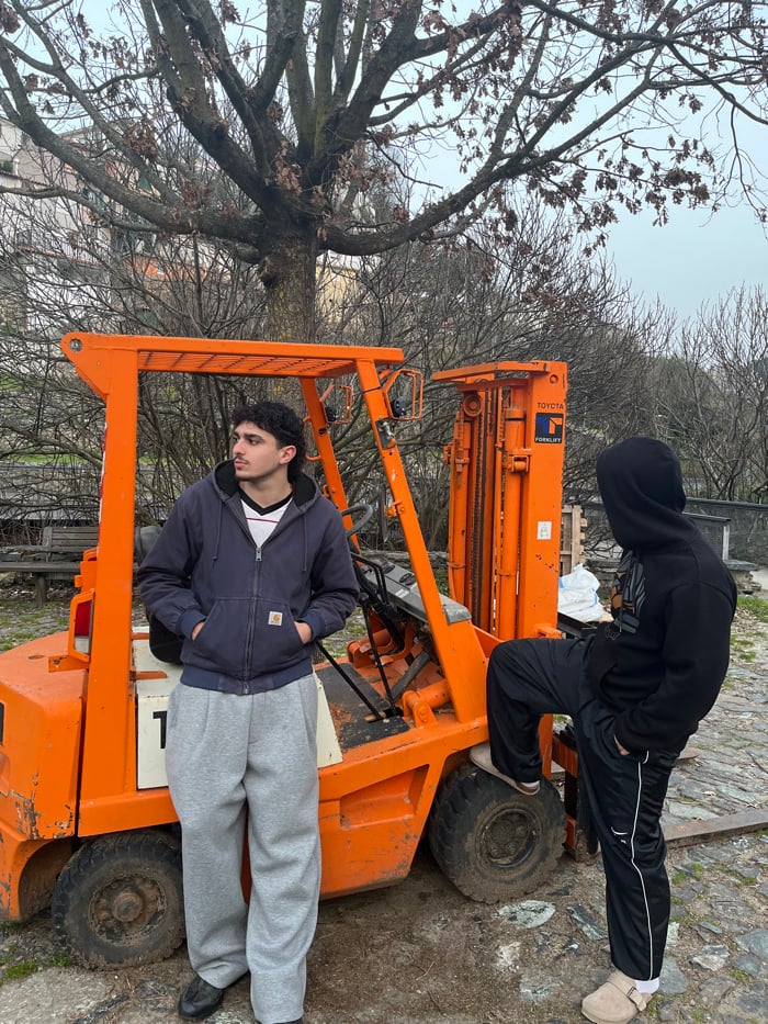 Young adults explore Bragança Portugal sites during March evening