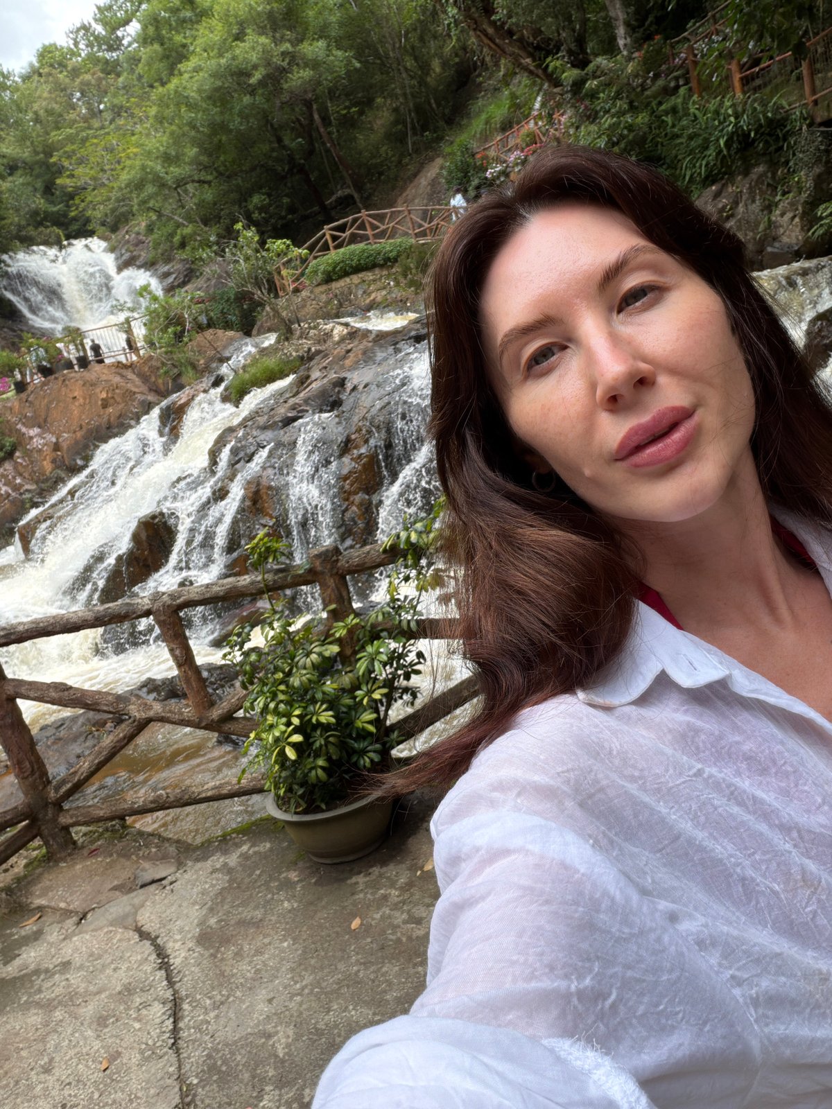 Early morning tourists explore Datanla Waterfall in Da Lat
