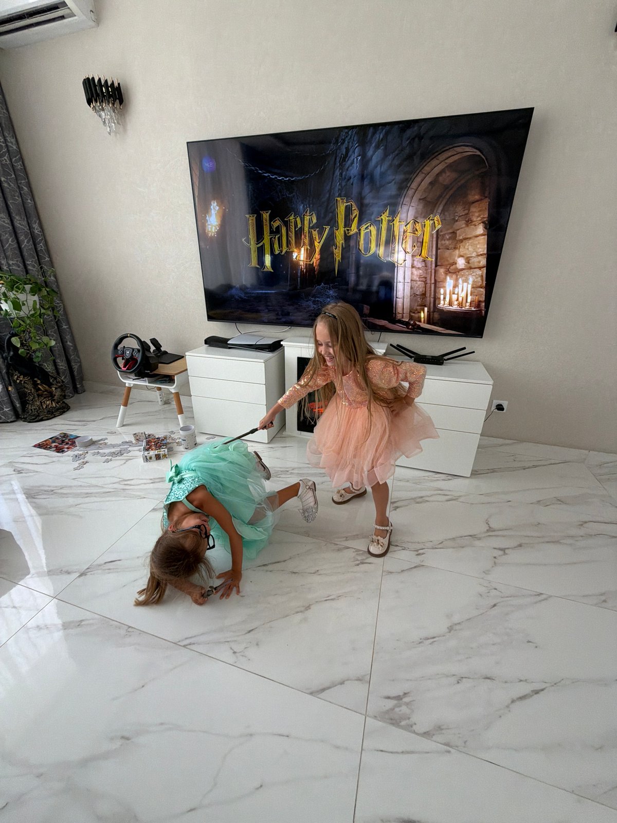 Party dress playtime and a lounging cat in Budva