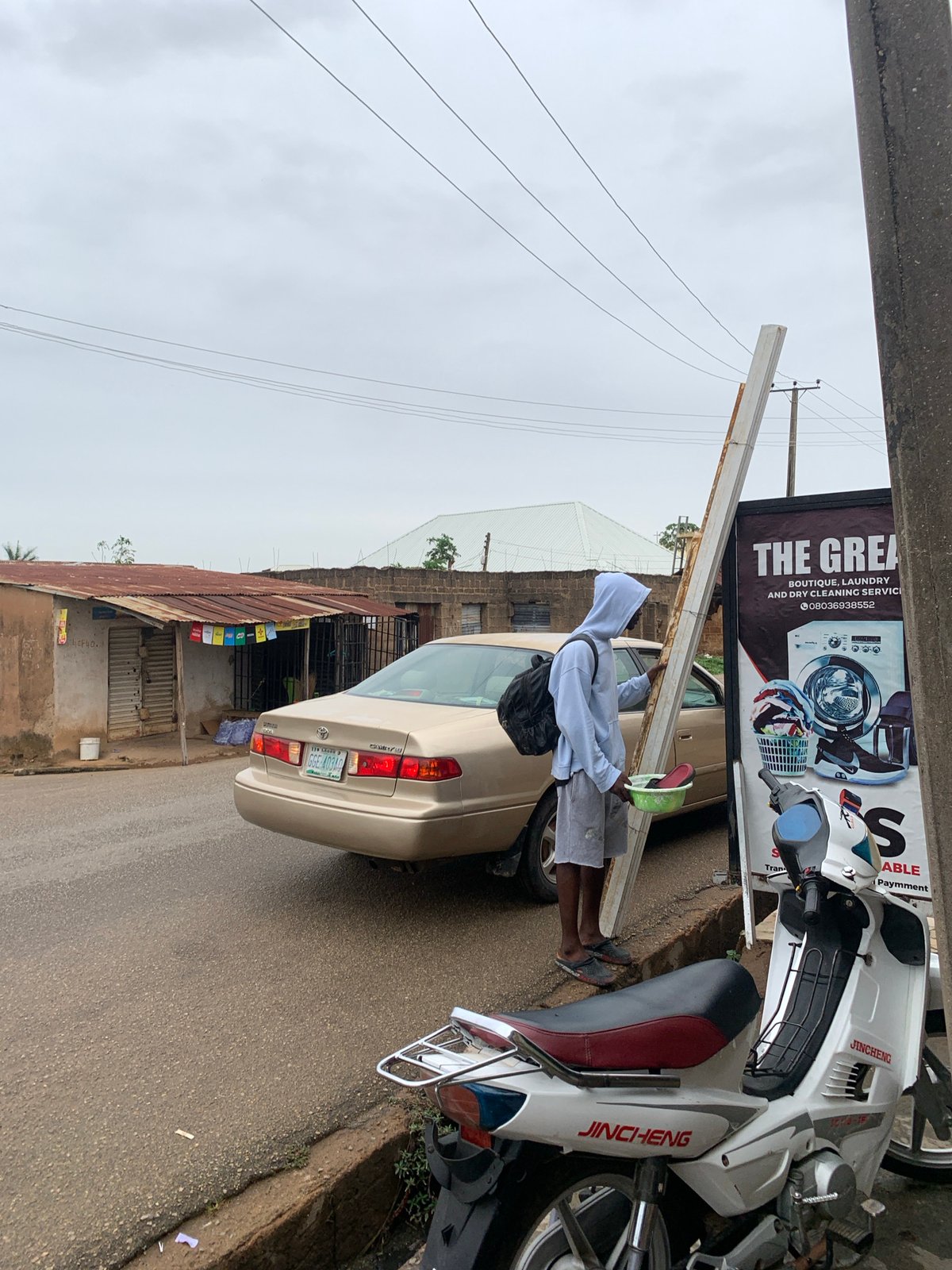 Morning street life documented across Jos, Nigeria neighborhoods