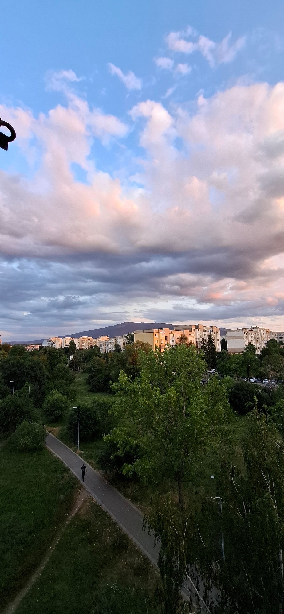 Sofia sunset watched from above, clouds and warm light