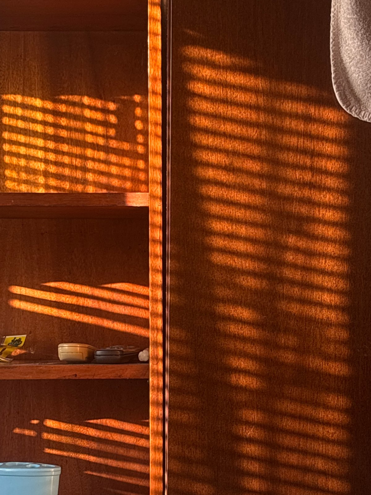 Sunlight and shadows across a home's surfaces, inside and out.