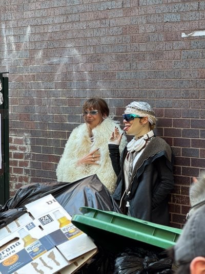 Pink beret group gathers, performs across NYC transit system