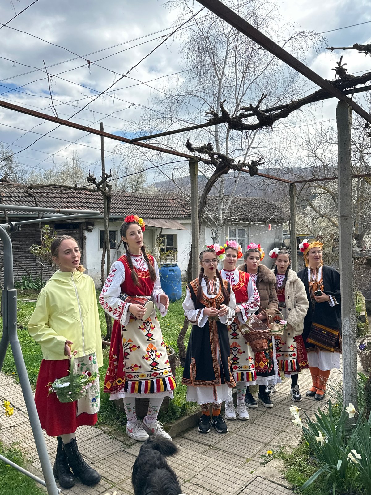 Women in traditional Bulgarian dress gather in Mrachenik
