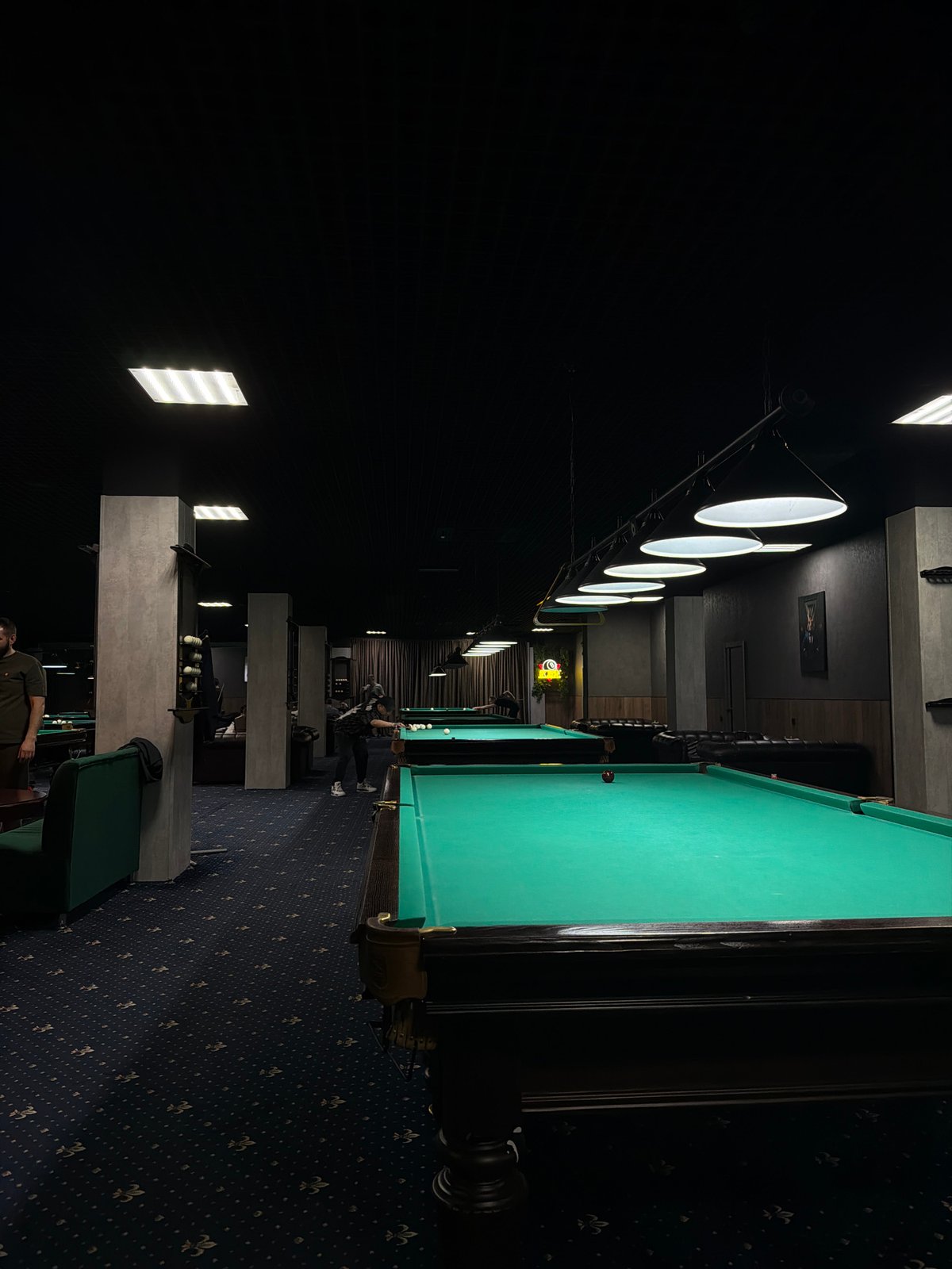 Billiard hall with multiple pool tables documented in Orenburg