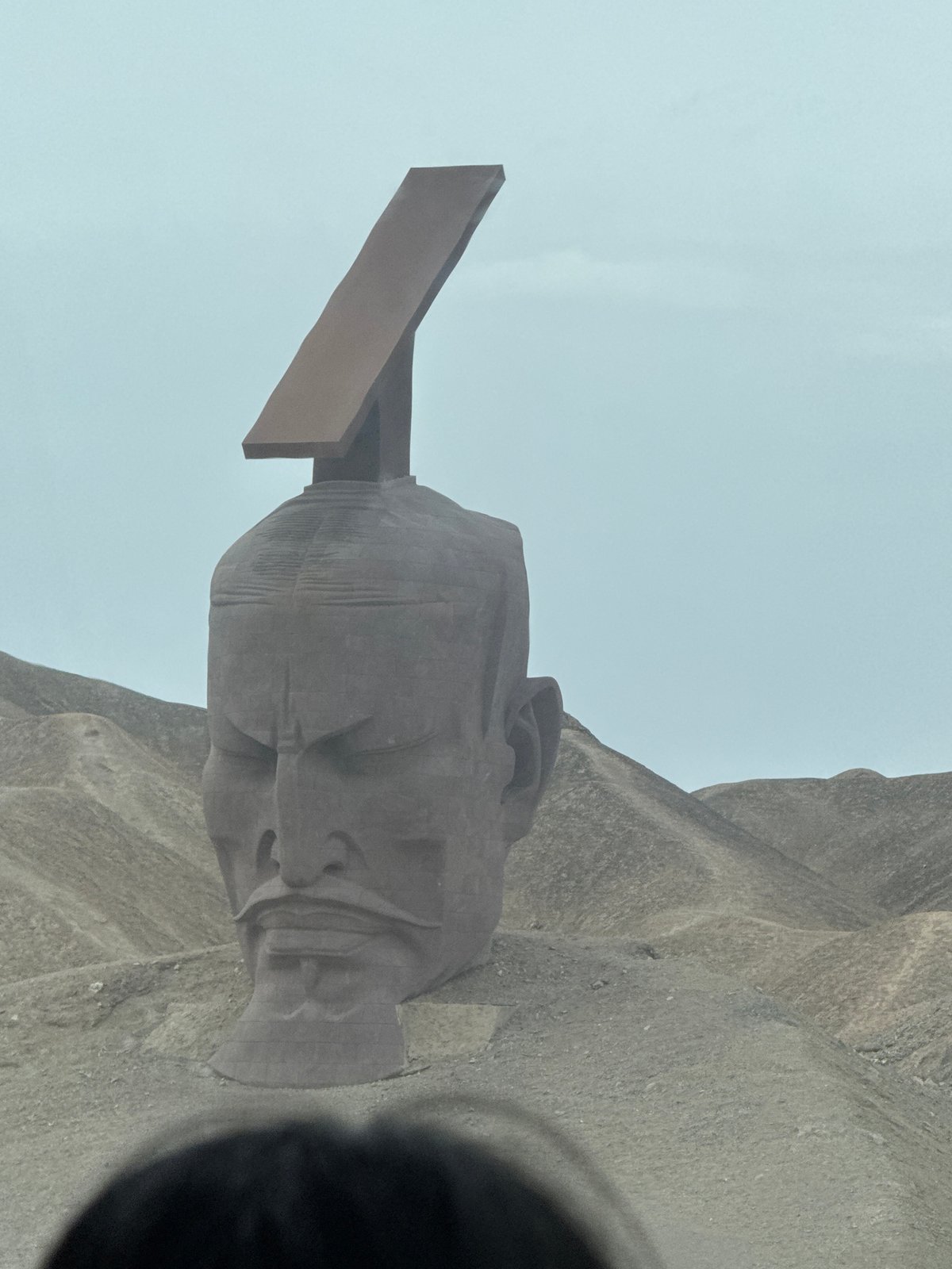 Stone head sculpture observed in Guazhou County, China