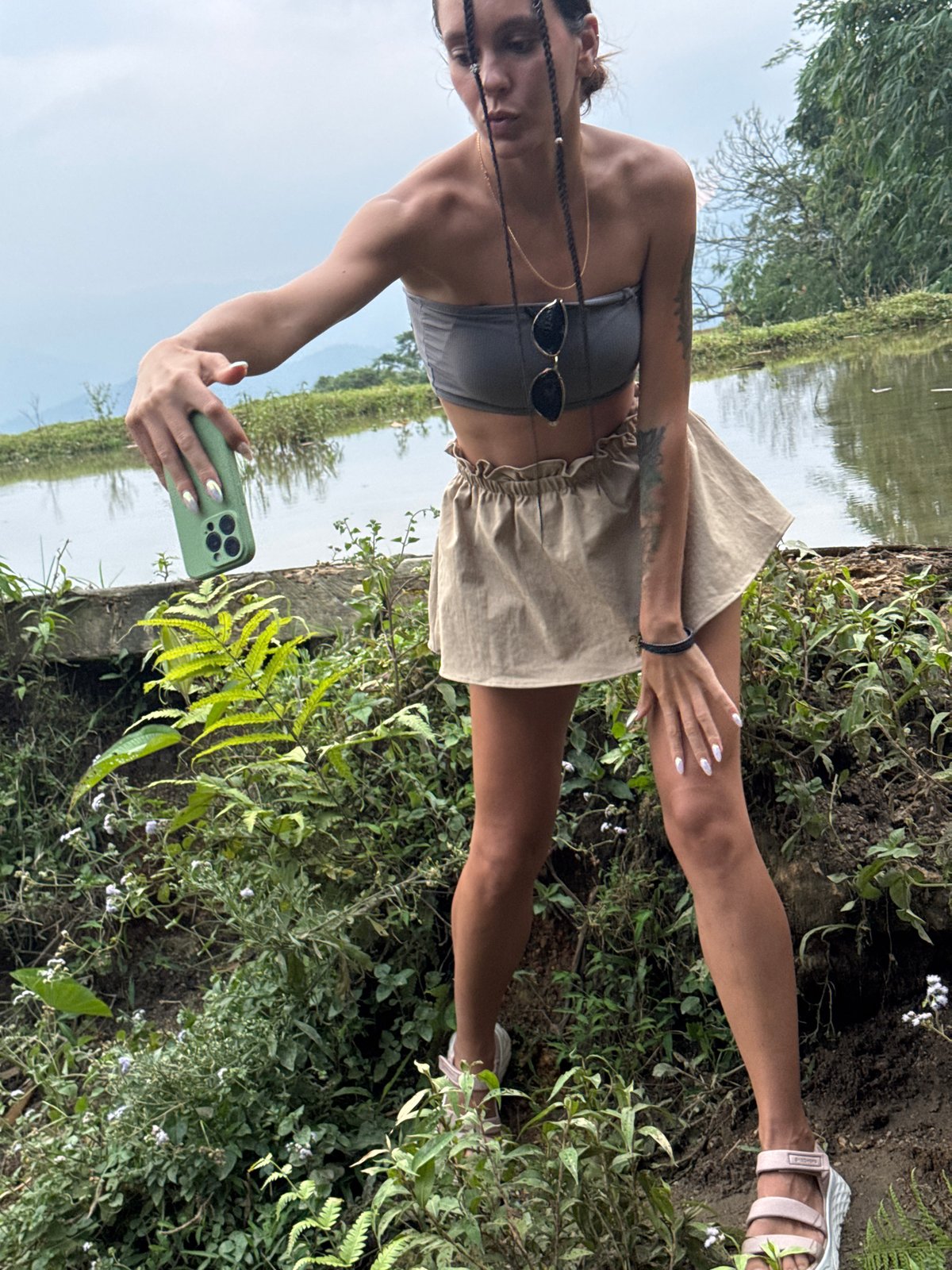 Tourists photograph scenic rice paddies in rural Vietnam