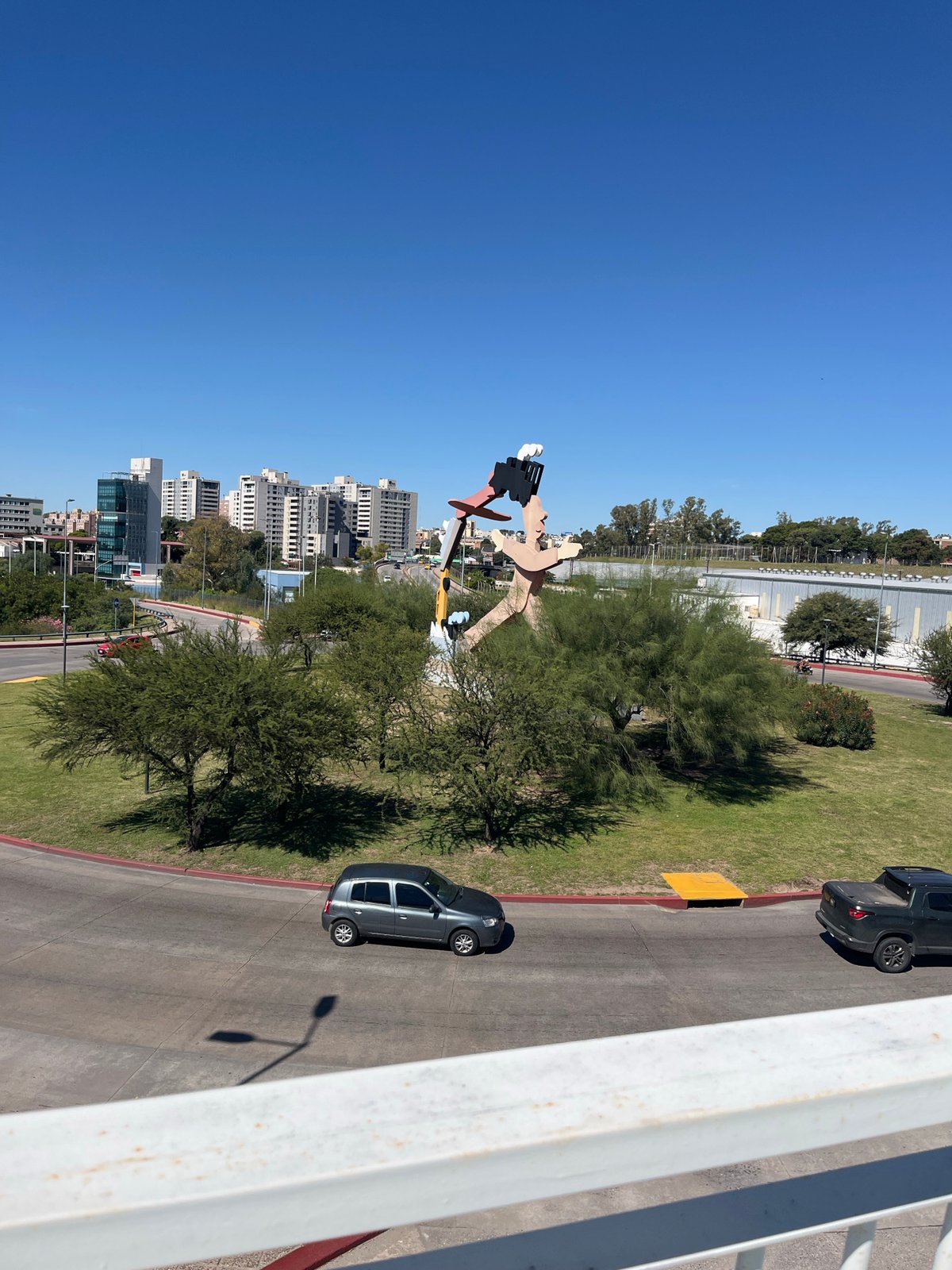 Bridge observer documents Cordoba landmarks including Bicentennial Lighthouse