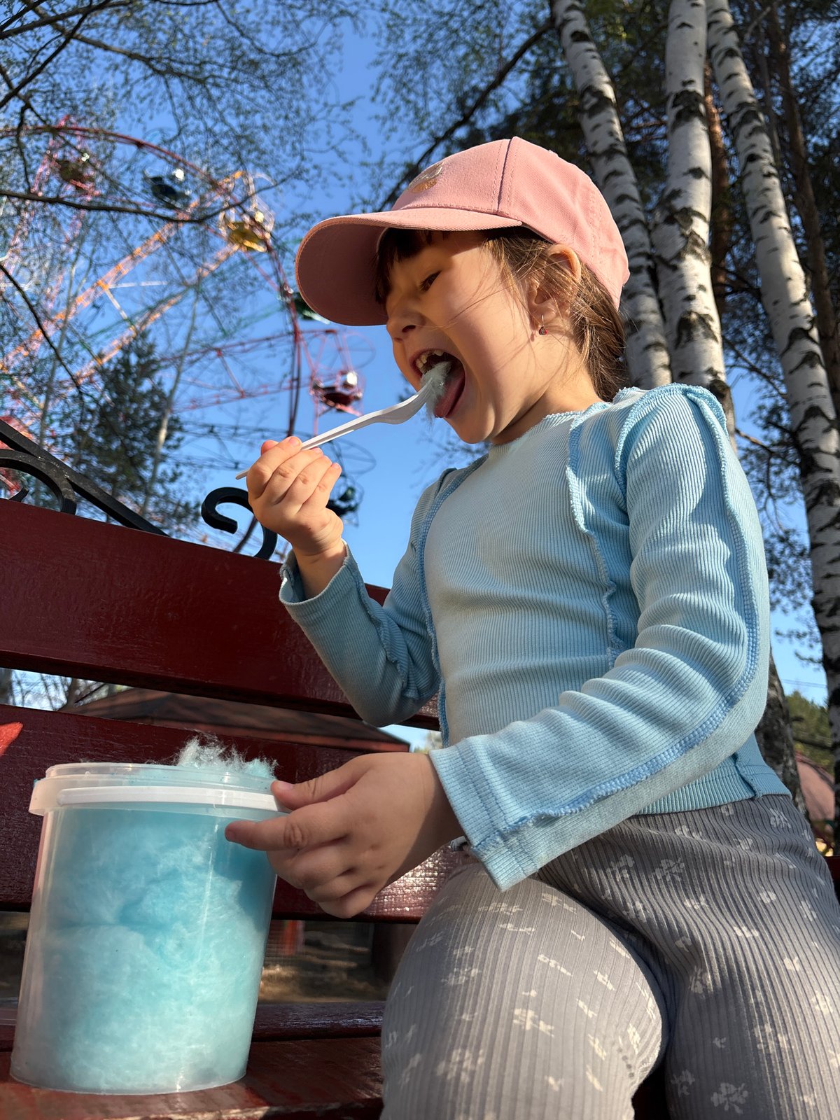 Family enjoys cotton candy, park games in Chaikovsky