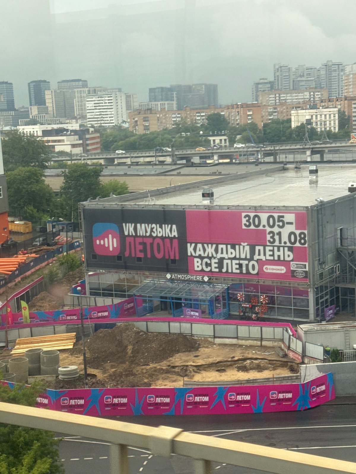 Train ride through Moscow's modern cityscape, July 2026