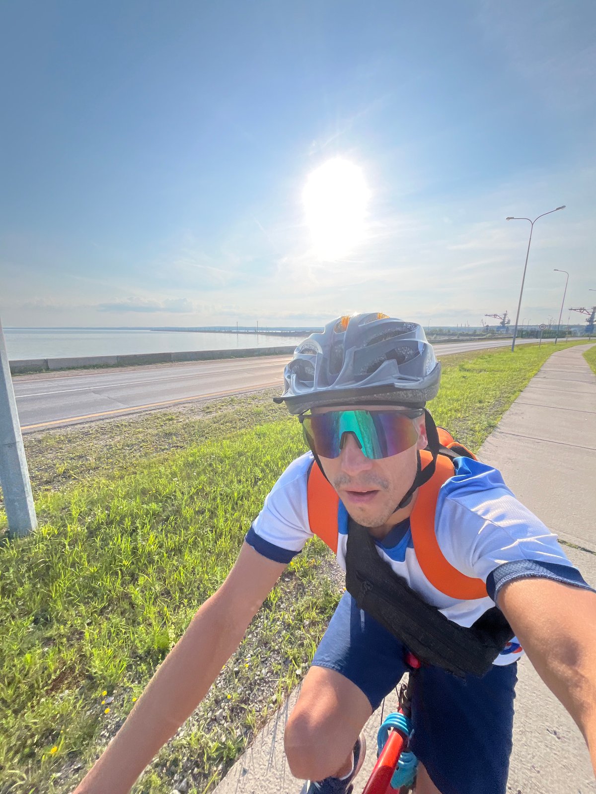 Cycling a sunny paved path in Chaikovsky, Russia