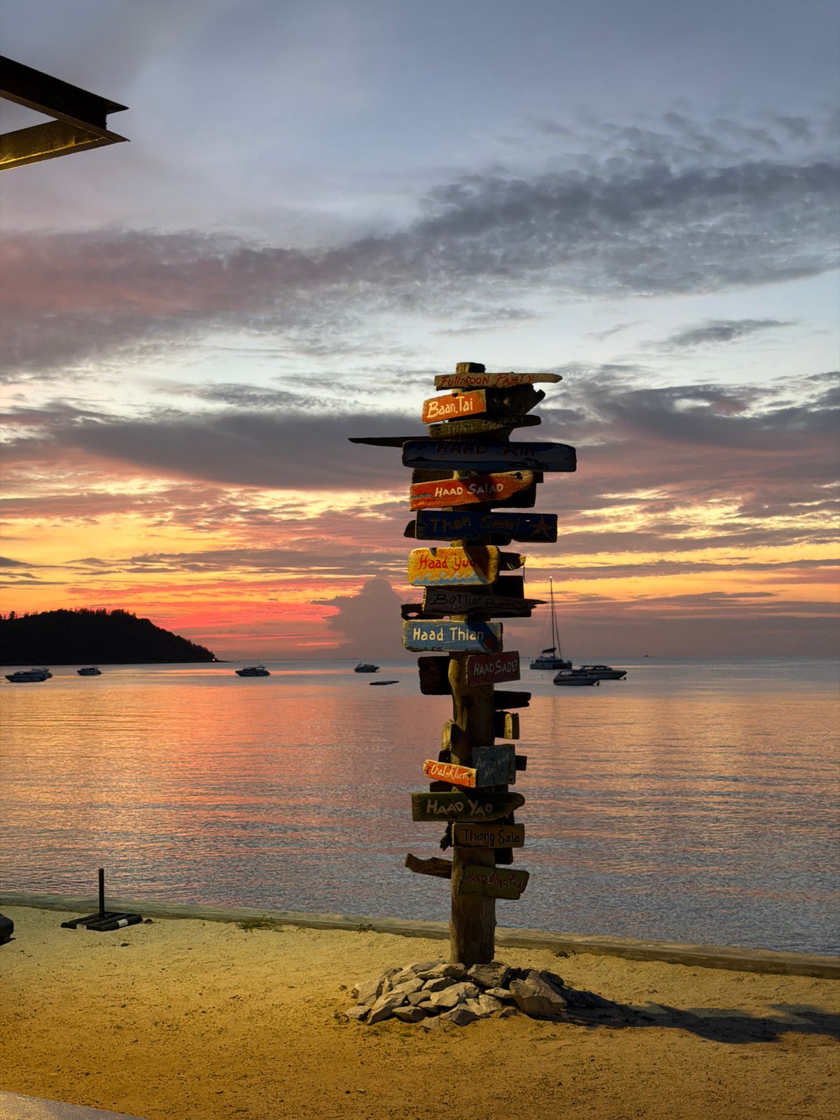 Ko Samui beach at dusk: signs, eats, and calm water