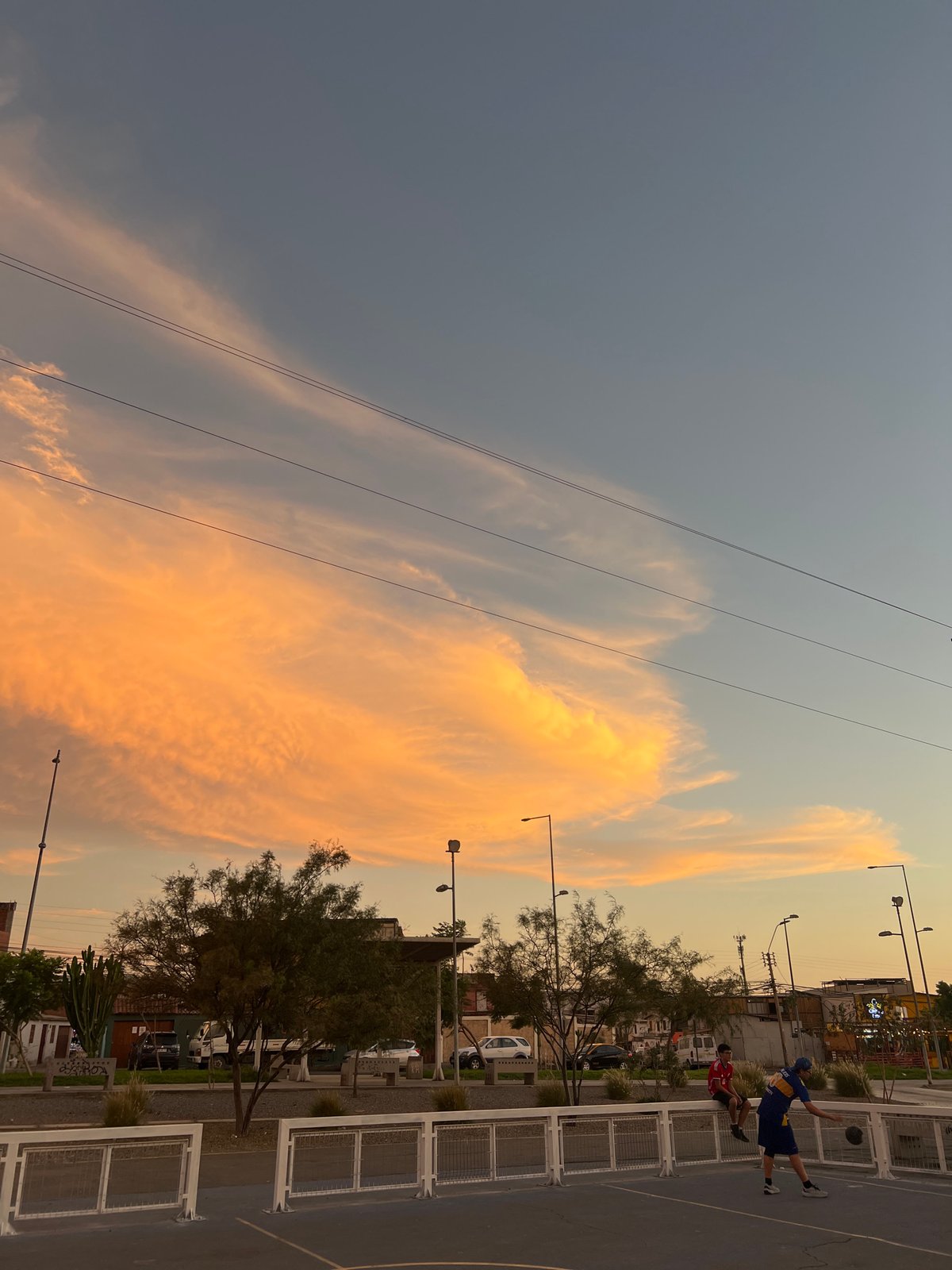 Evening basketball and sunset scenes captured in Arica, Chile