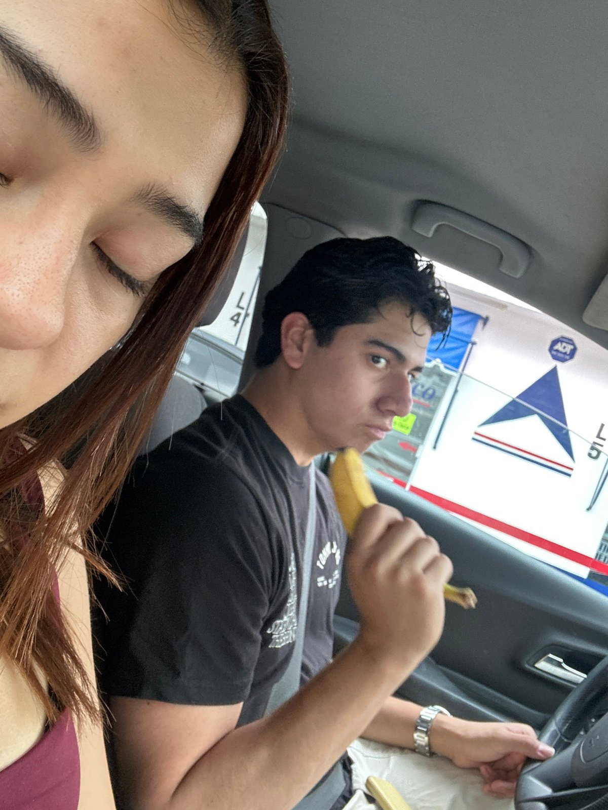 Passengers photograph themselves inside car in Puebla, Mexico