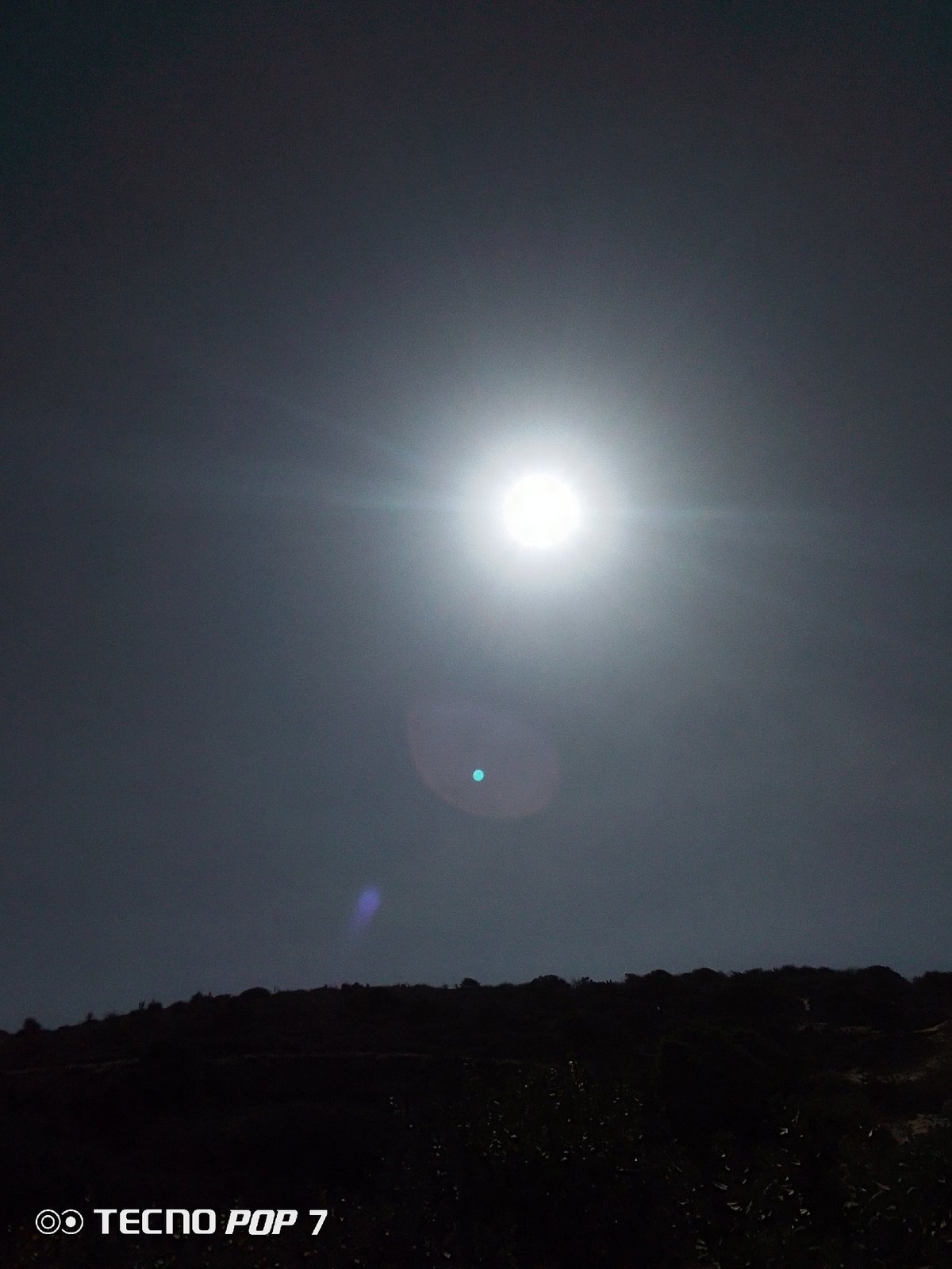 Bright celestial object photographed over Venezuelan landscape