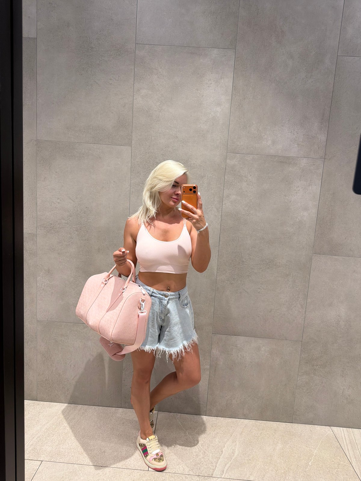 Woman's fitness shopping trip documented at retail complex