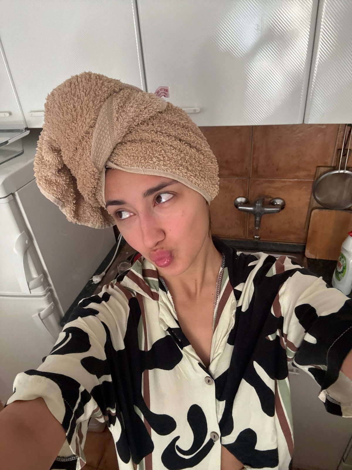Woman takes bathroom selfie in Sutomore, Montenegro