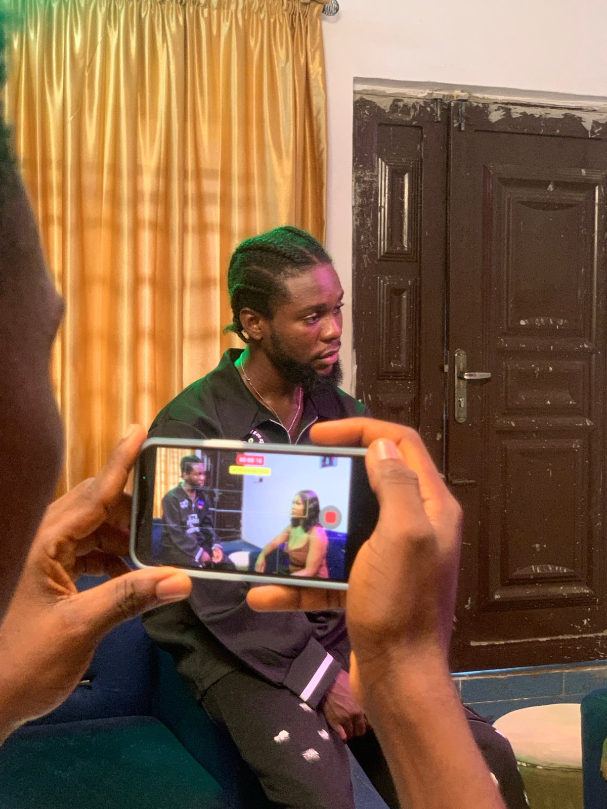Behind-the-scenes of a video shoot in Ikorodu, Nigeria