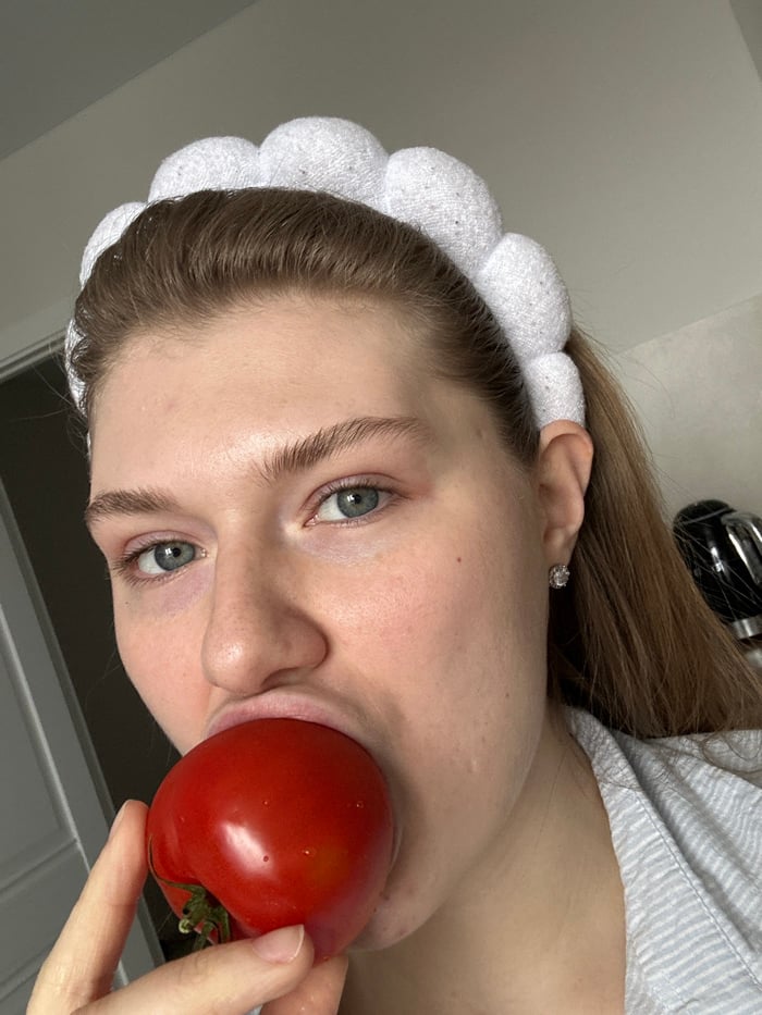 Woman's playful morning routine captured in Kazan apartment