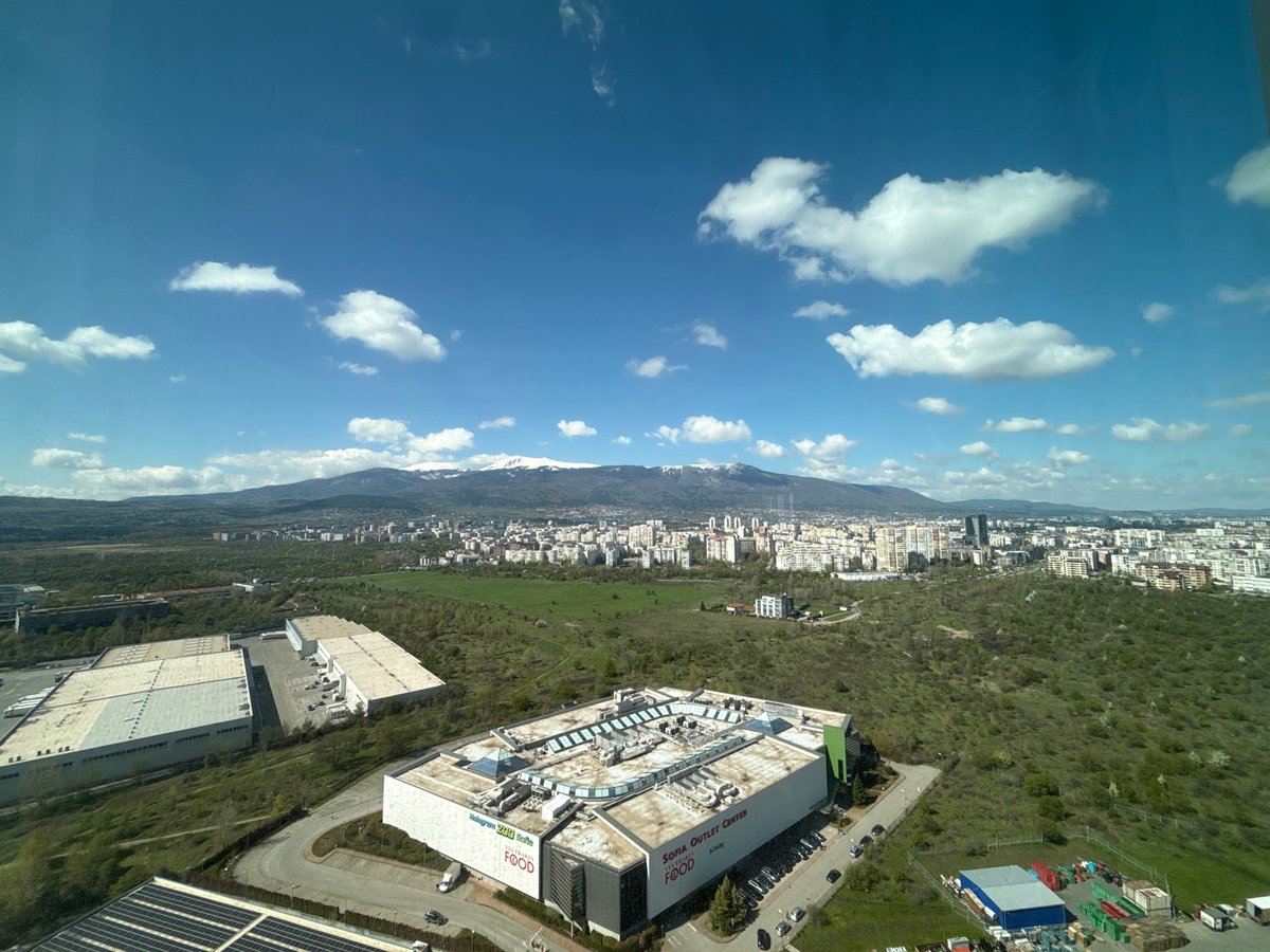 Sofia cityscape photographed with snow-capped mountains backdrop