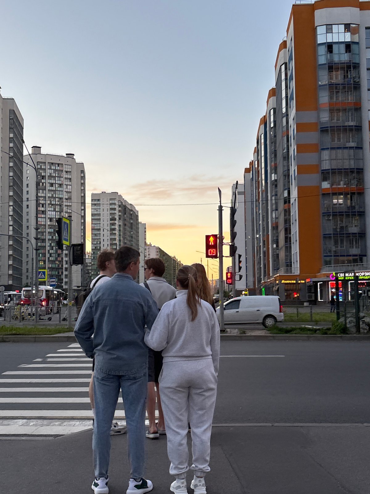 Evening street life documented across unknown Russian city