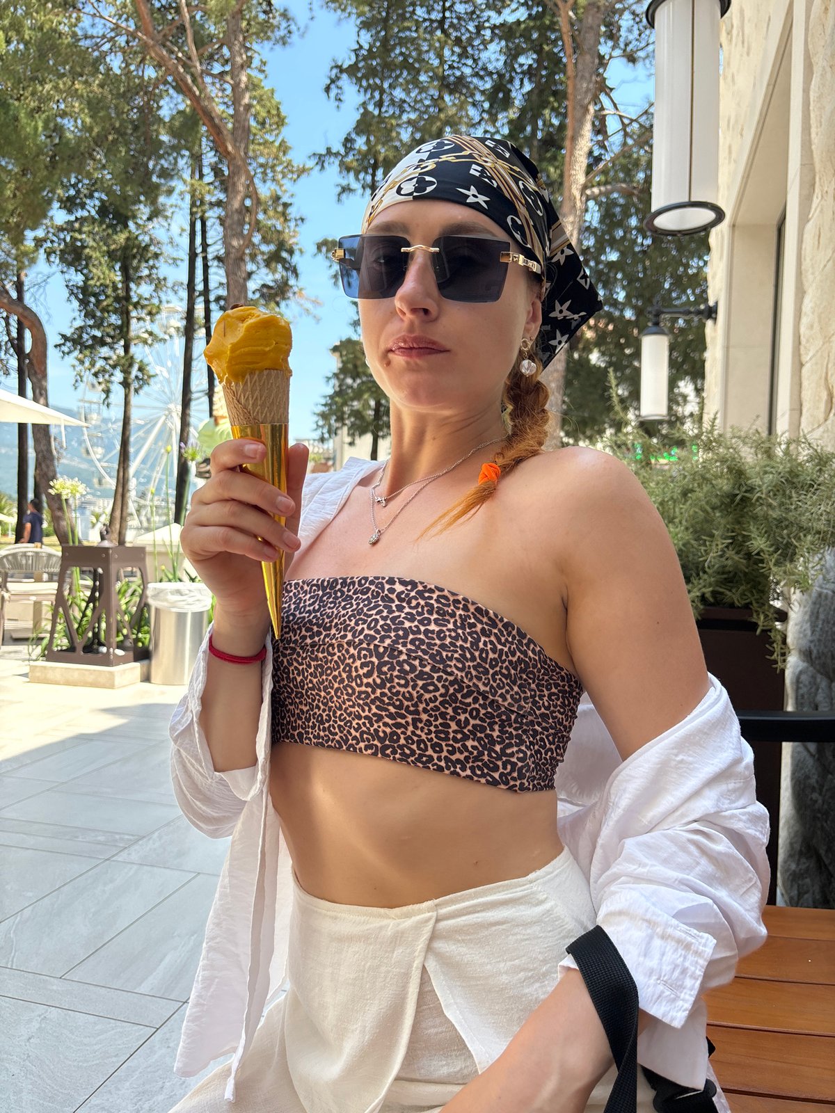 Tourist enjoys ice cream and pizza in Budva Montenegro