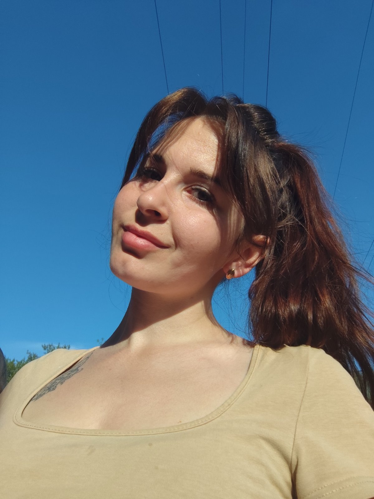 Woman with baby enjoys outdoor time in Фоки, Russia