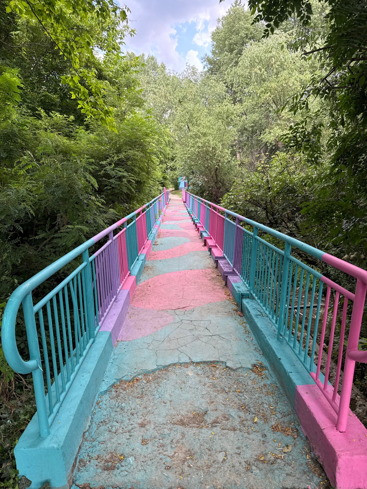 Pastel-painted bridge and stairs in a Stara Zagora park