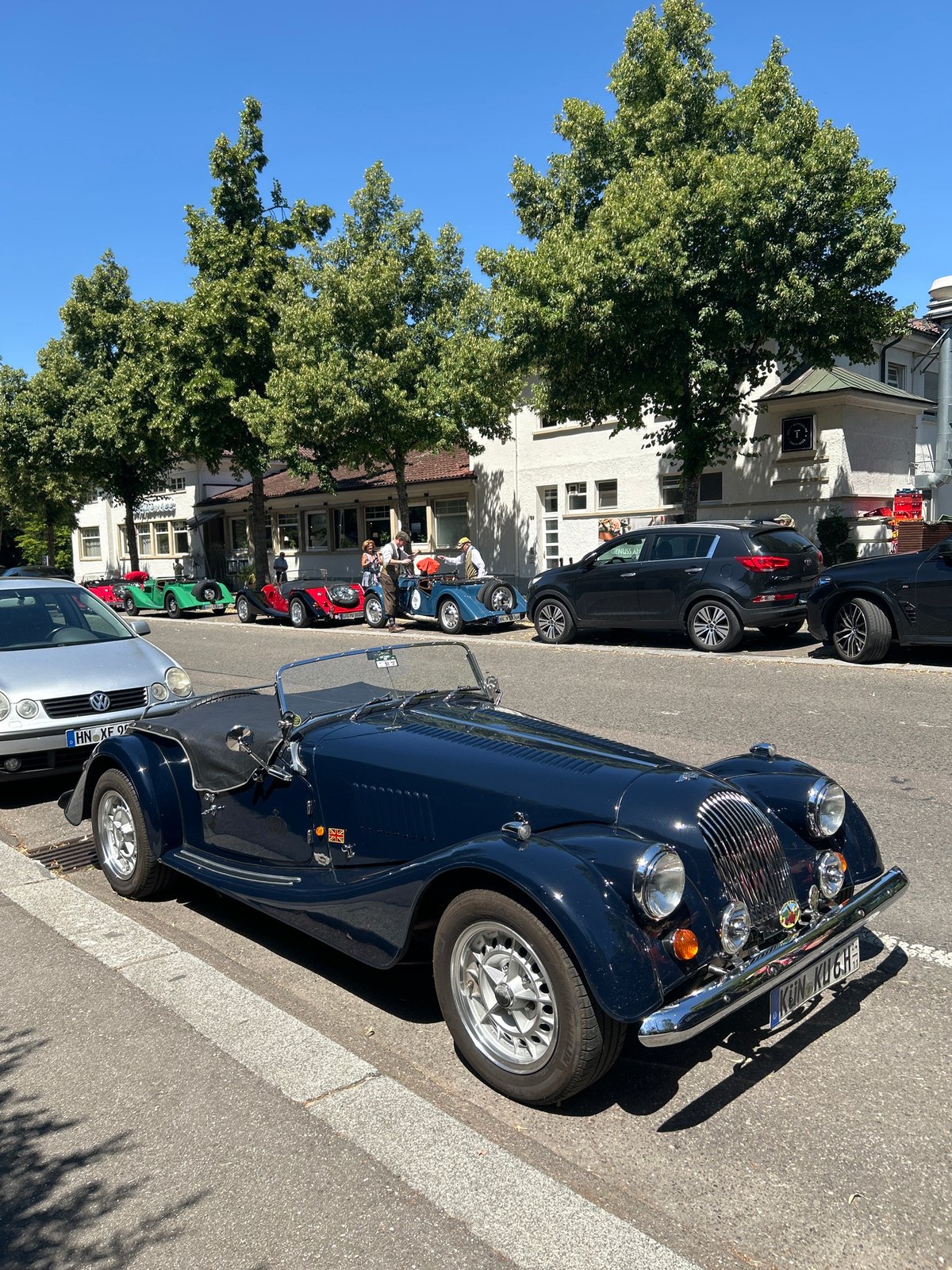 Classic convertibles lined up on a sunny Heilbronn street
