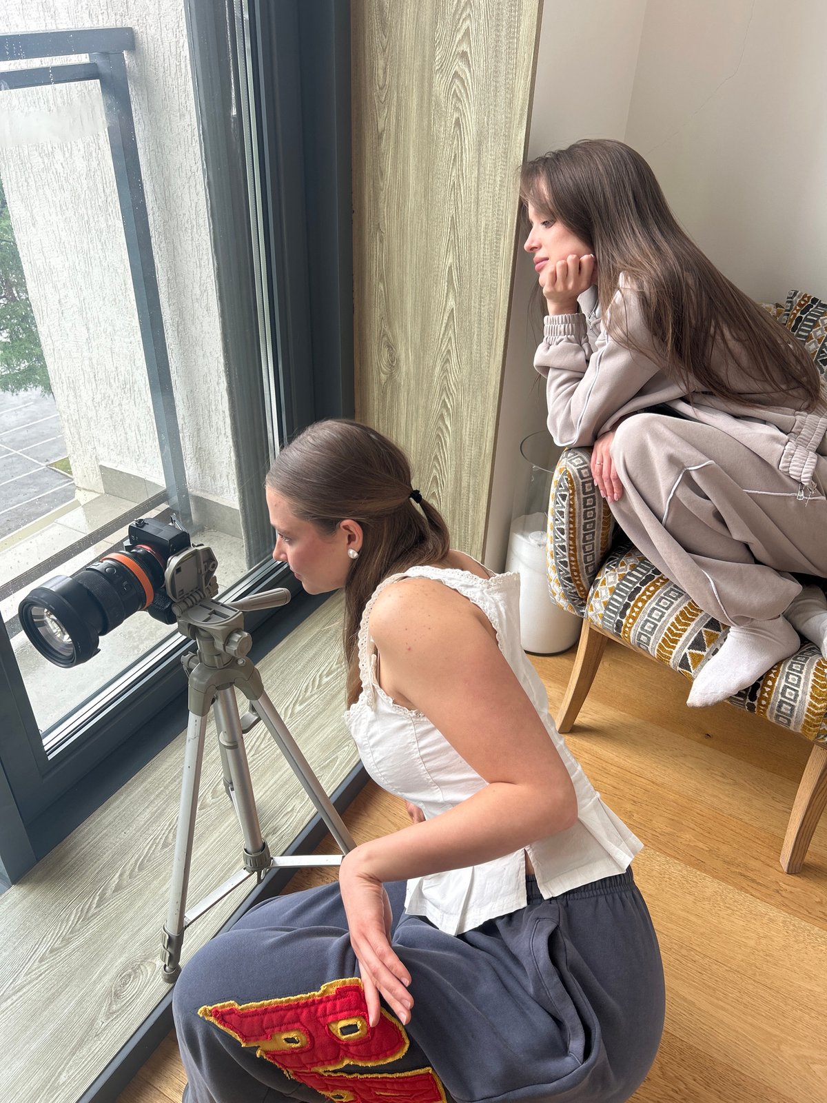 Woman sets up Sony camera equipment in Izhevsk building