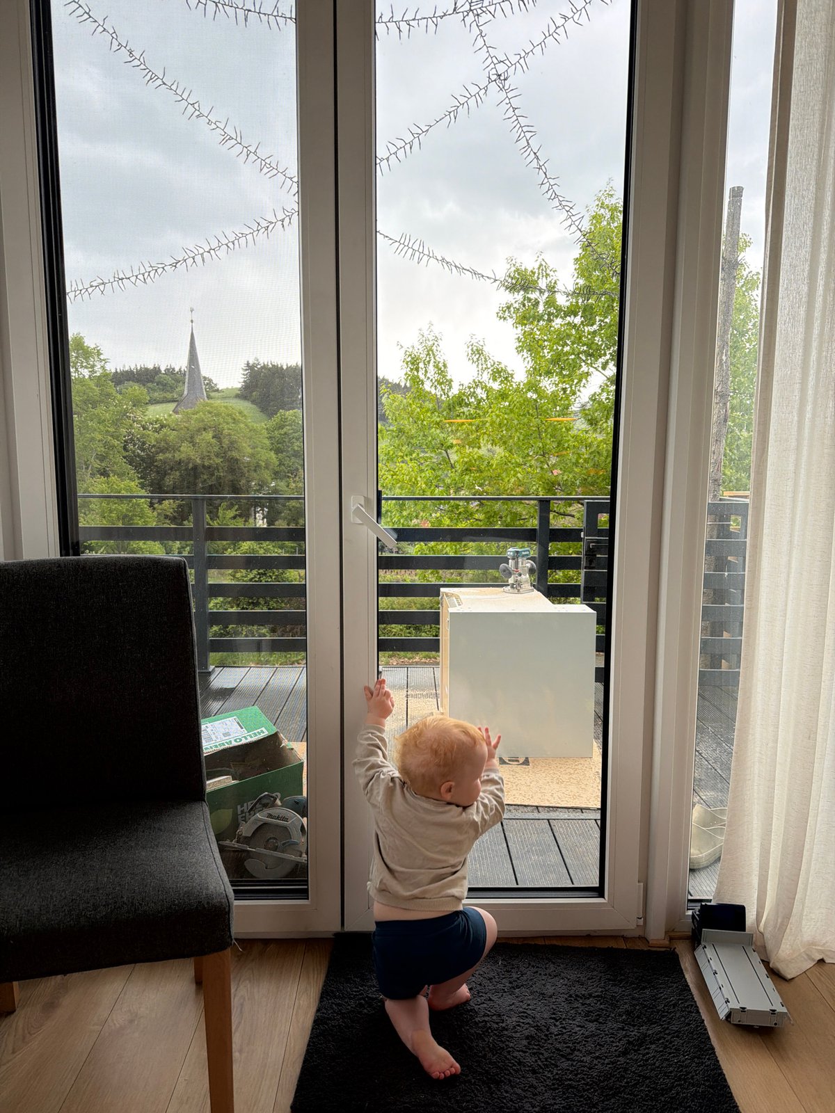 Quiet afternoon moments in Gangloff: woodworking, pets, and children