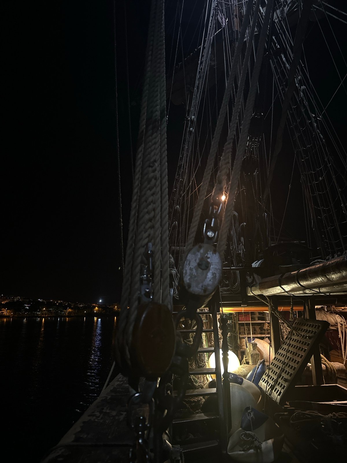 Tall ship Çamlık photographed at night dock in Datça