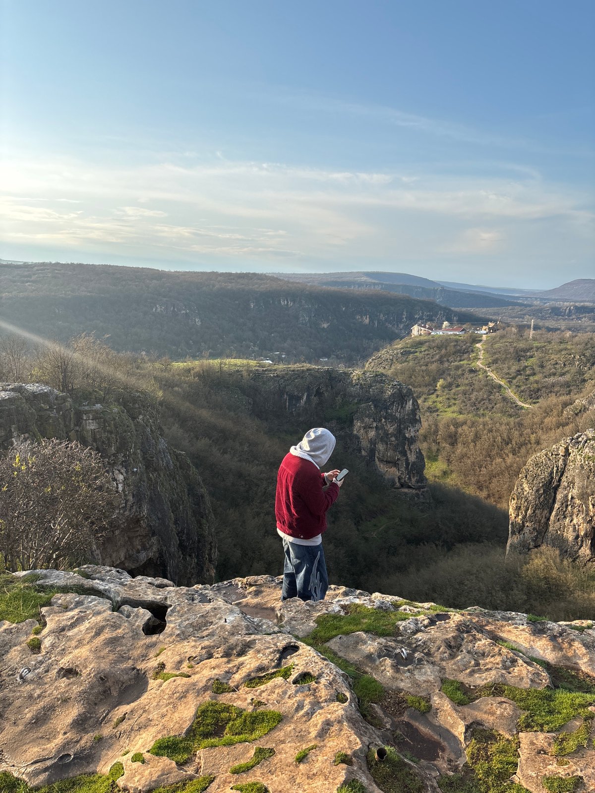 Tourists photograph scenic views from clifftops in Karlukovo, Bulgaria