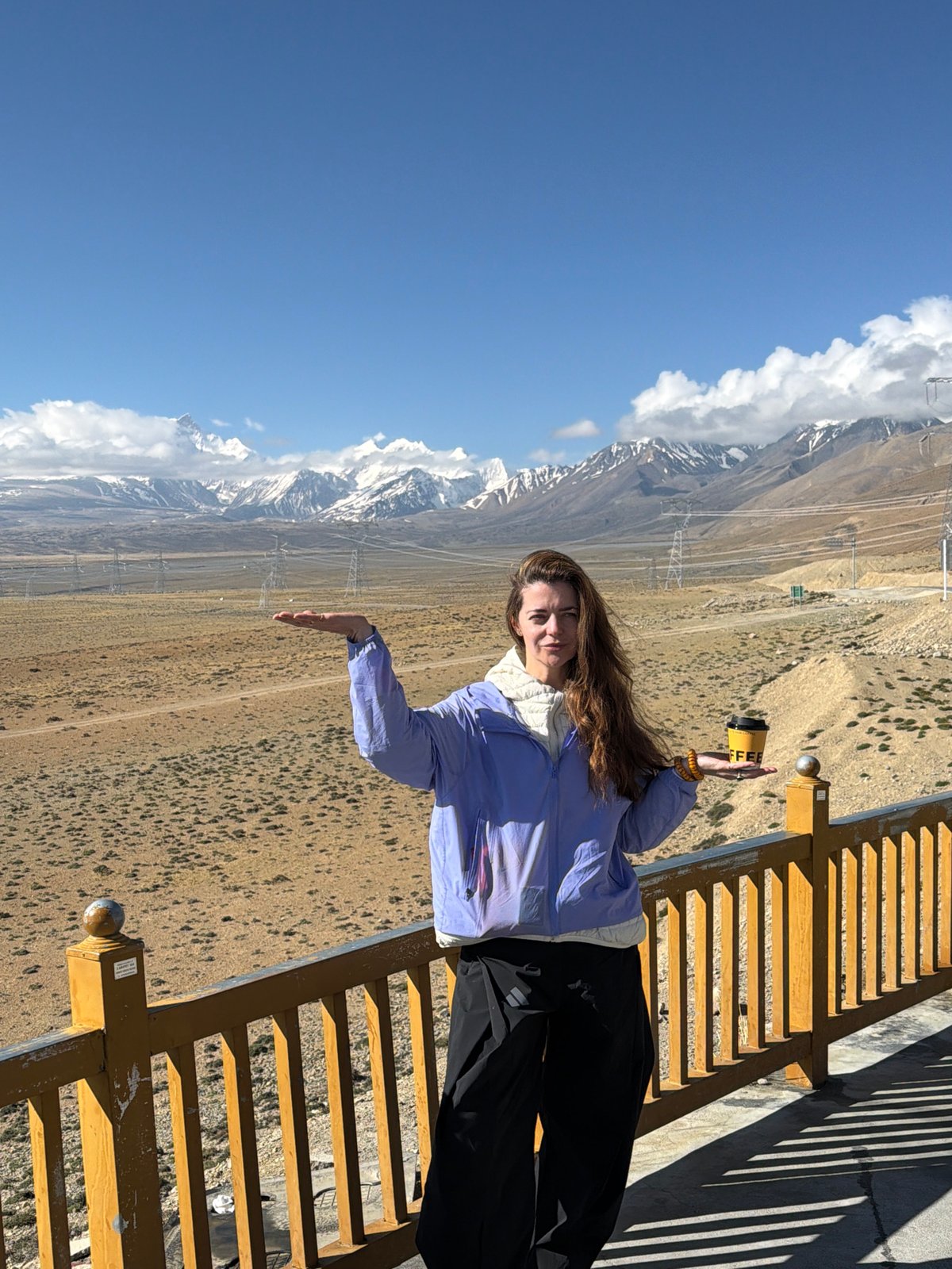 Tourist photographed amid vast Himalayan landscapes in Gyirong County