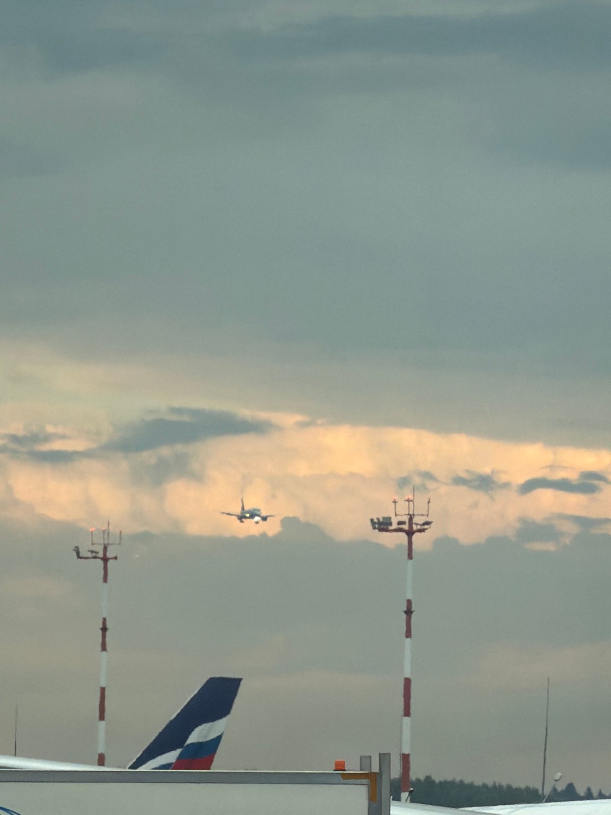 Afternoon at Sheremetyevo: terminal interiors and planes on a cloudy day