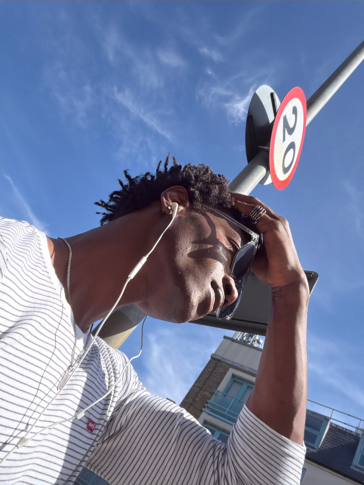 Person in striped shirt and sunglasses spotted in London