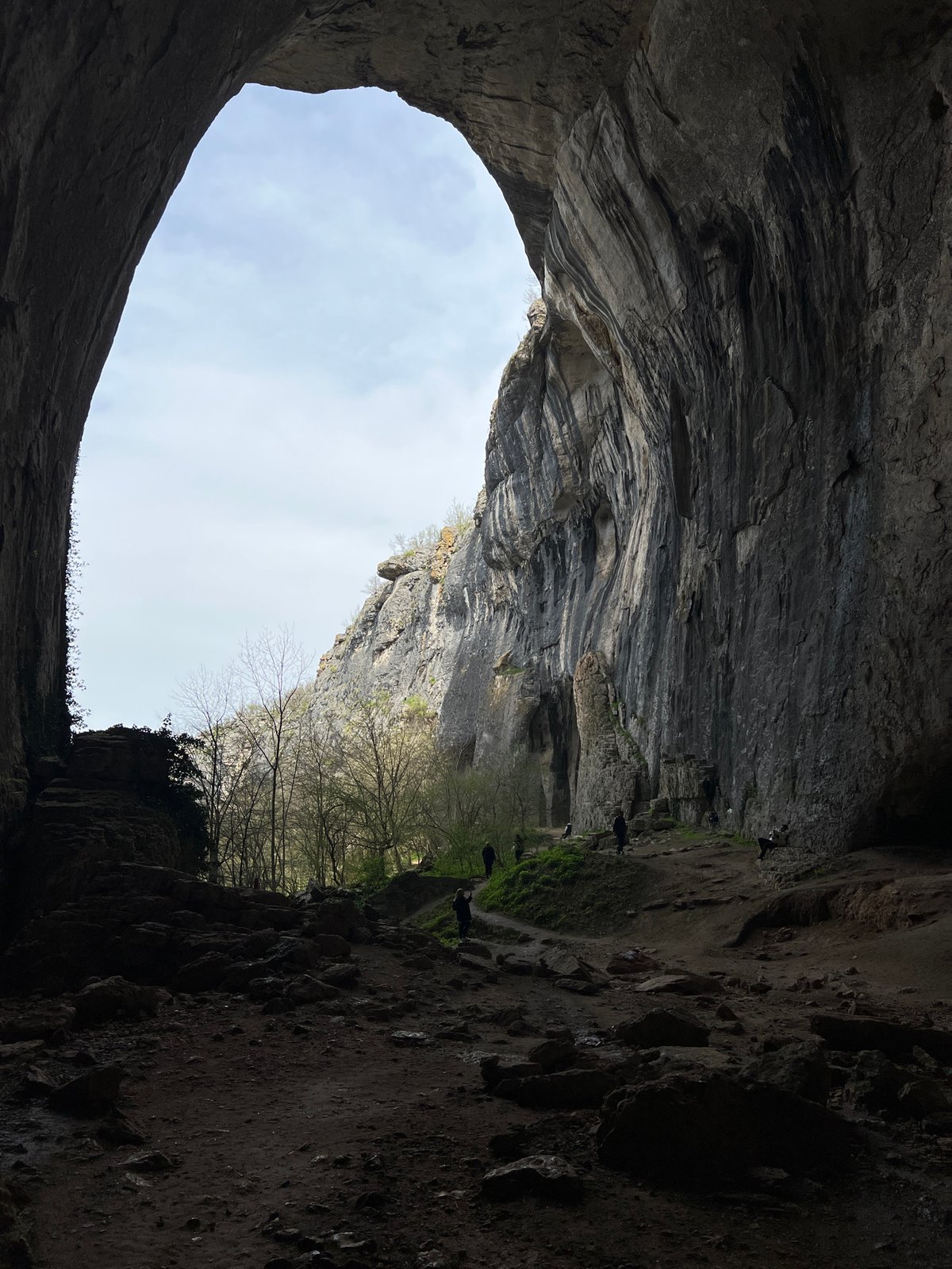 Tourist captures geological formations inside Devetashka Cave, Bulgaria