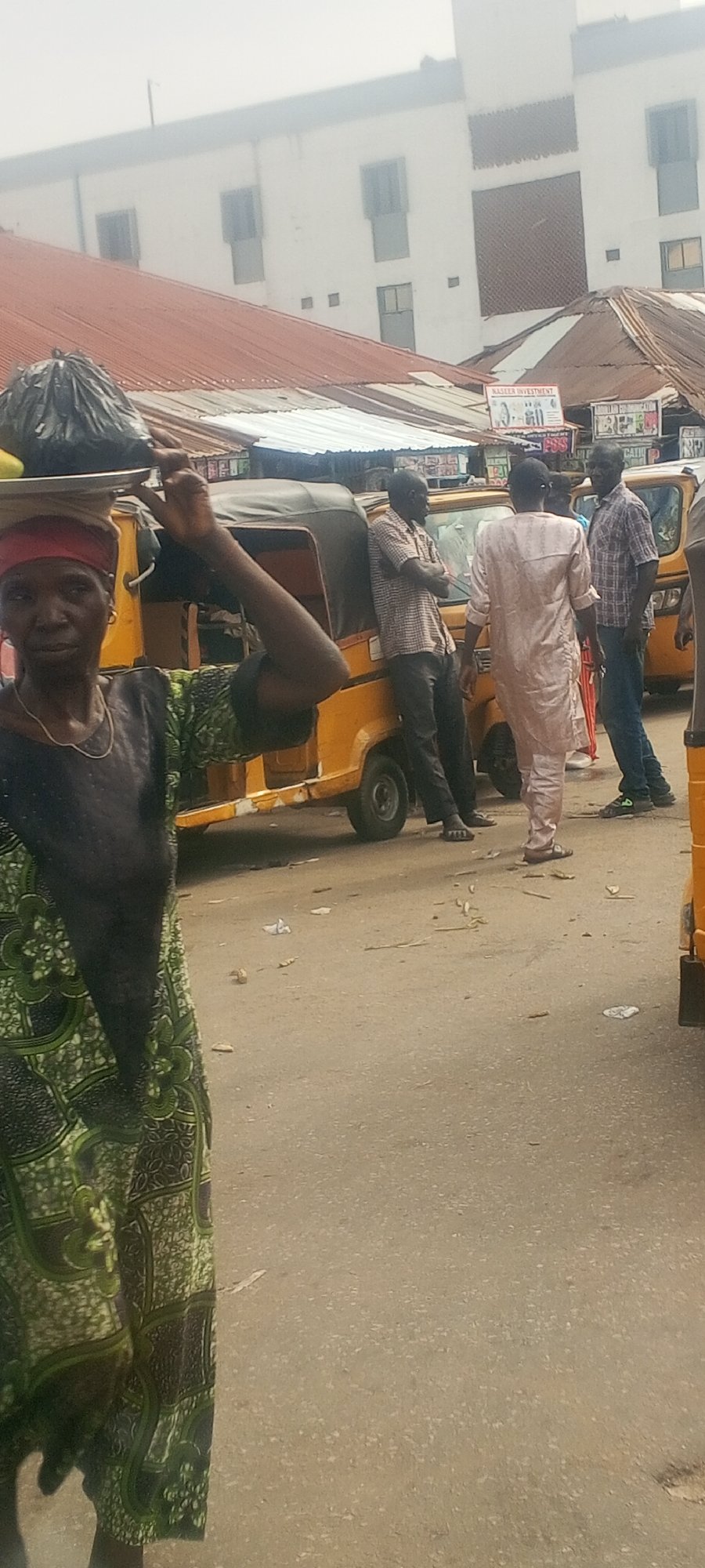 Daily life unfolds in Nigerian streets and markets