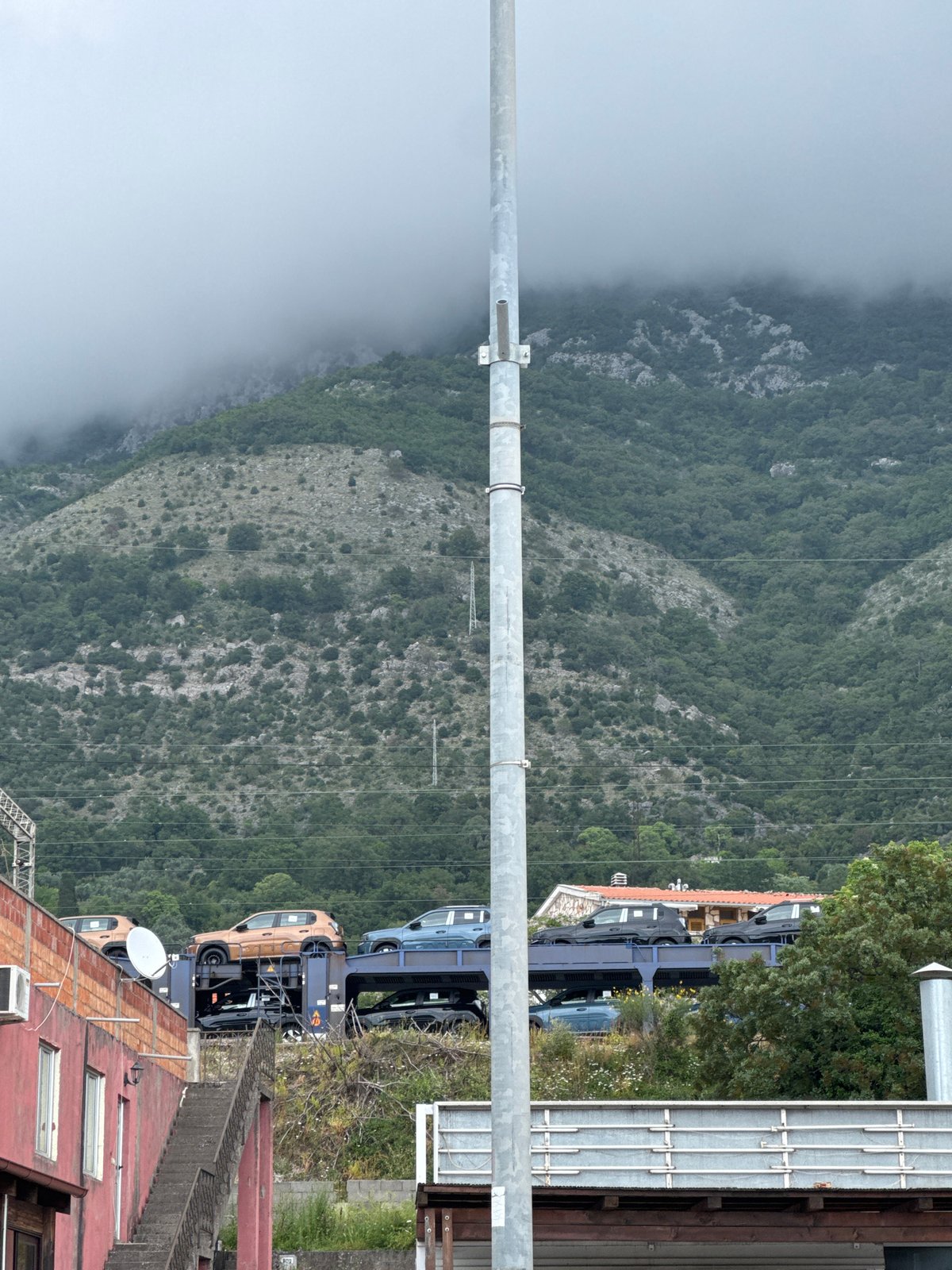 Fog blankets mountain landscape in Miljevci, Montenegro