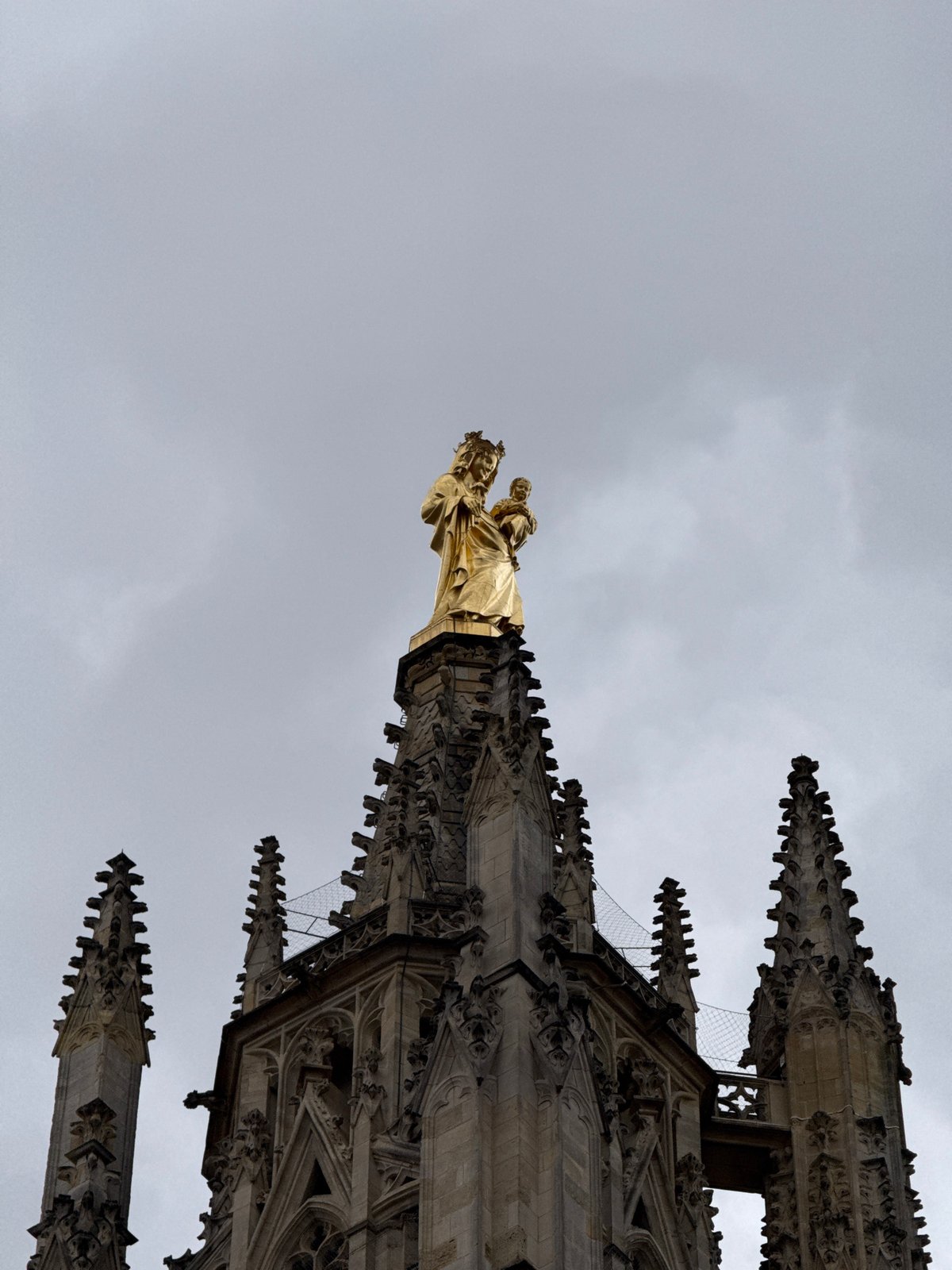 Tourist documents afternoon walking tour of historic Bordeaux landmarks
