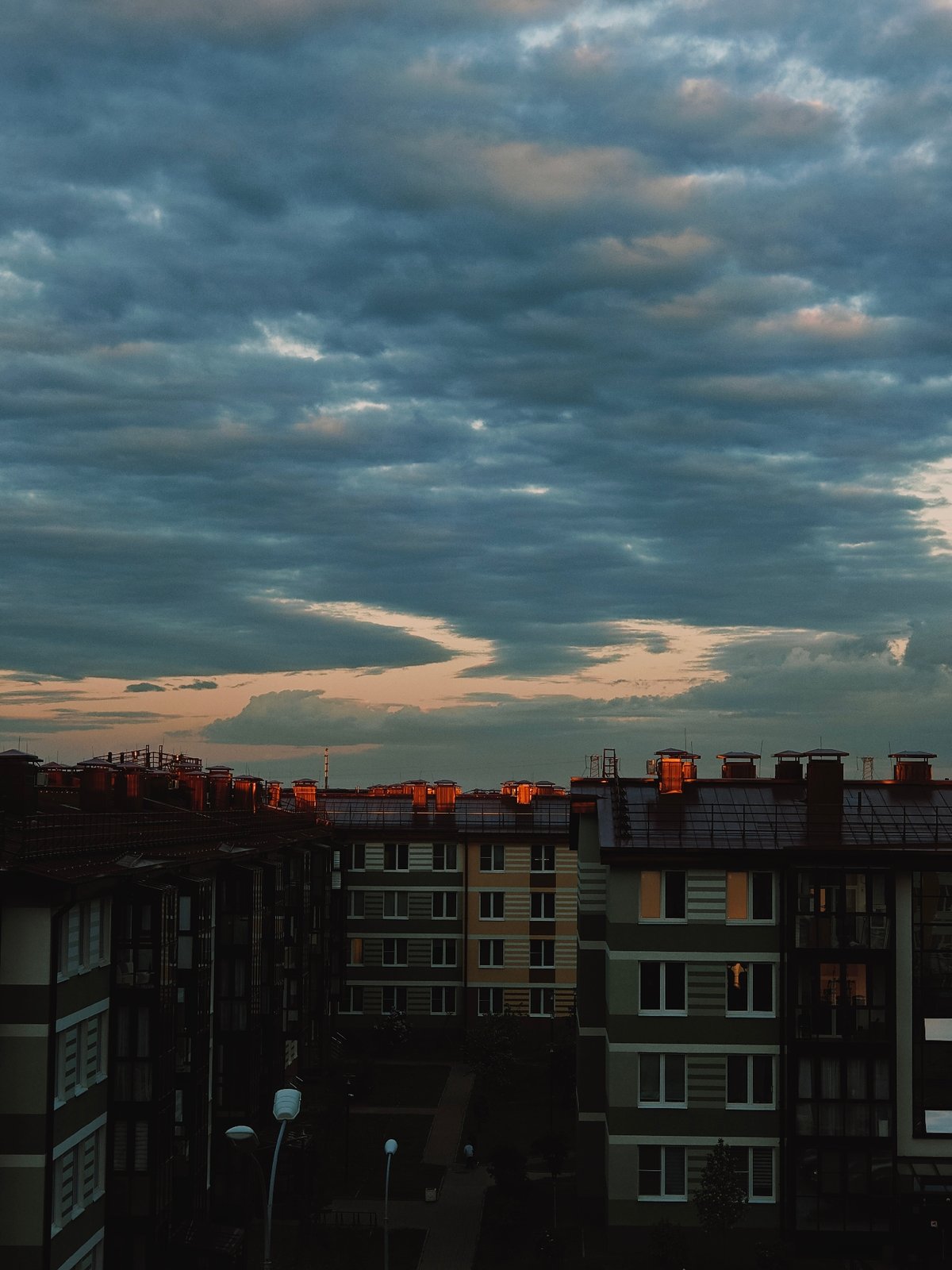 Dramatic sky observed over Shushary apartment buildings