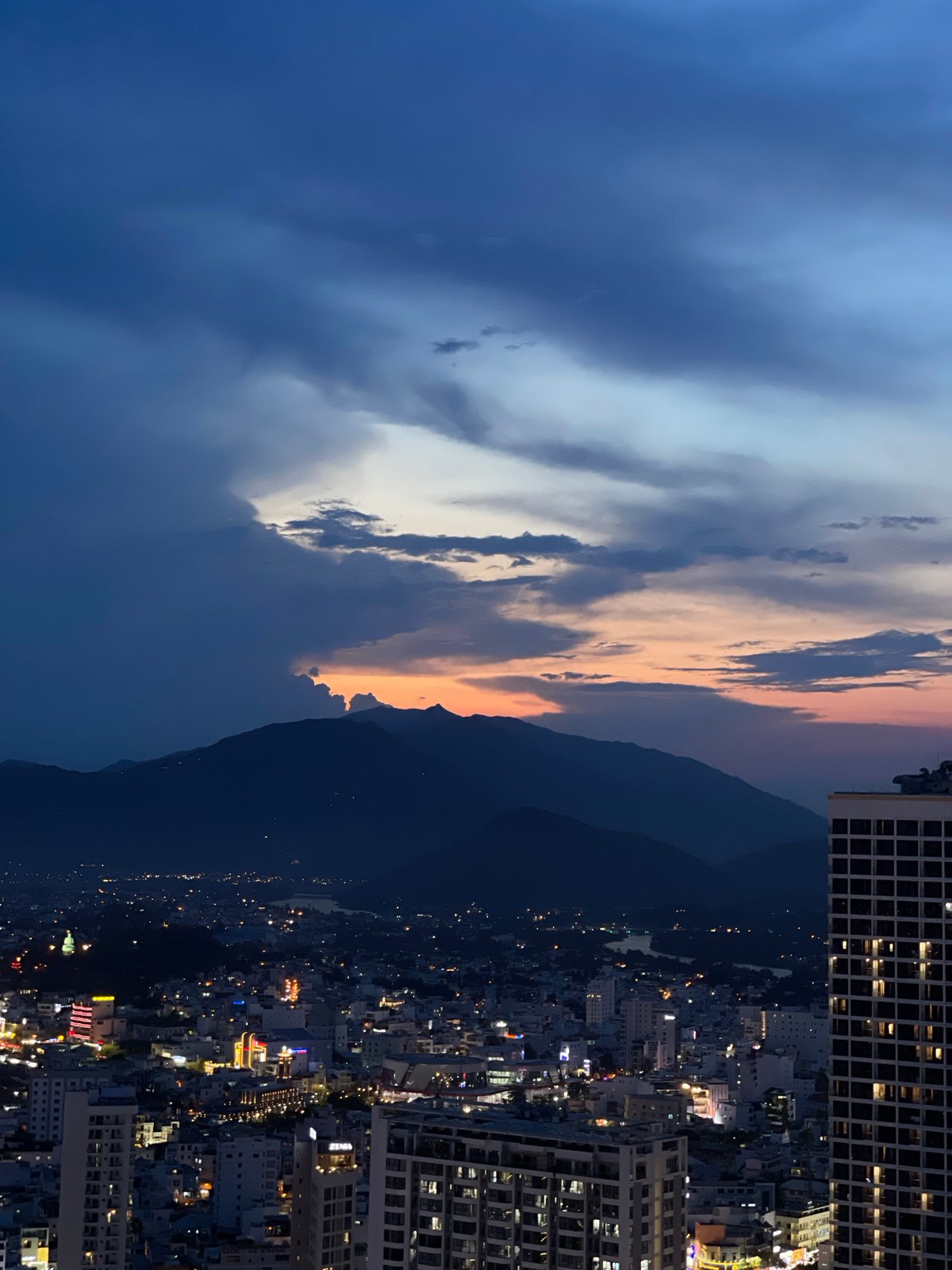 Dusk to night transition captured over Nha Trang cityscape