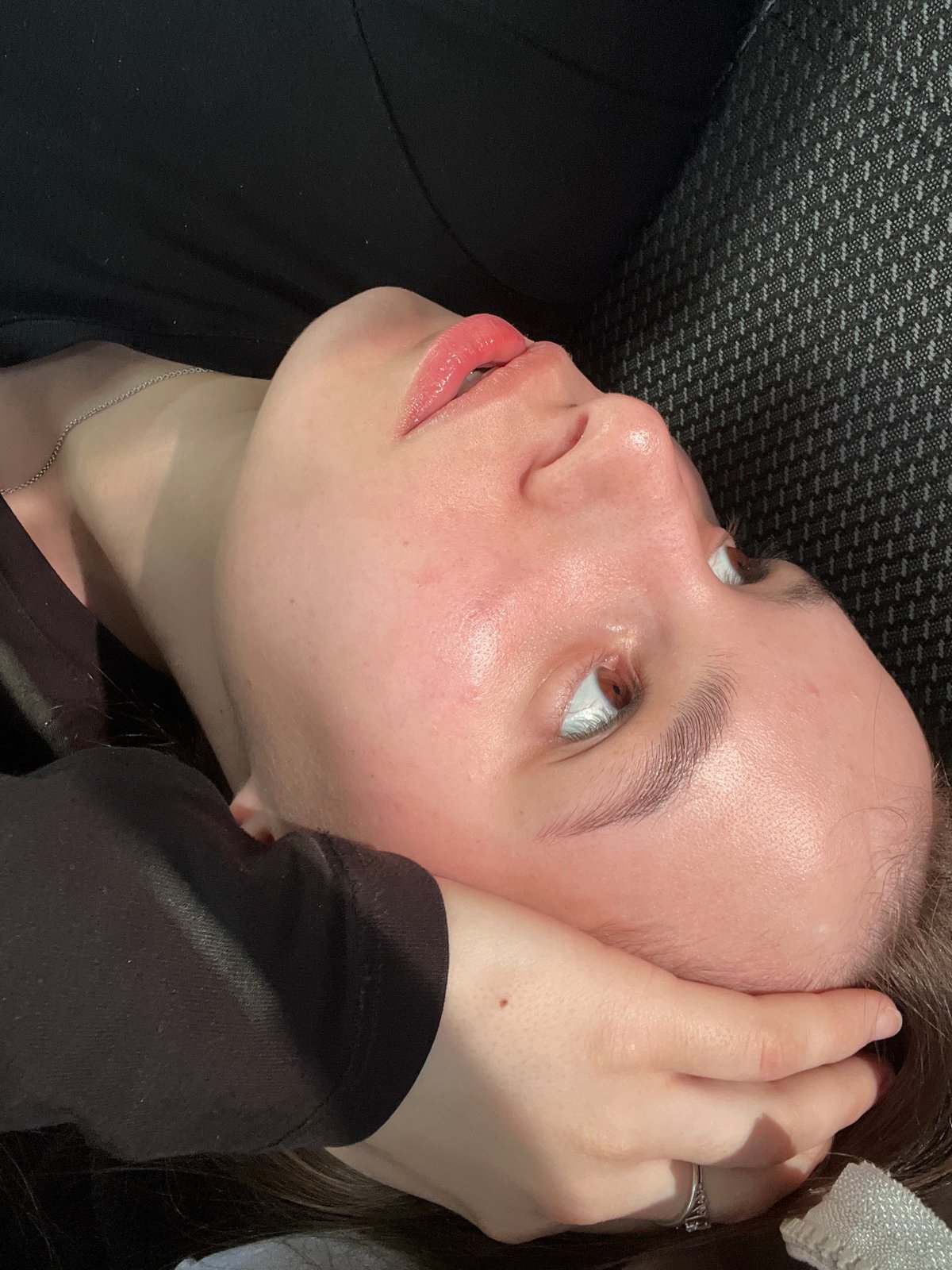Person captured resting with hand on forehead in Chaikovsky
